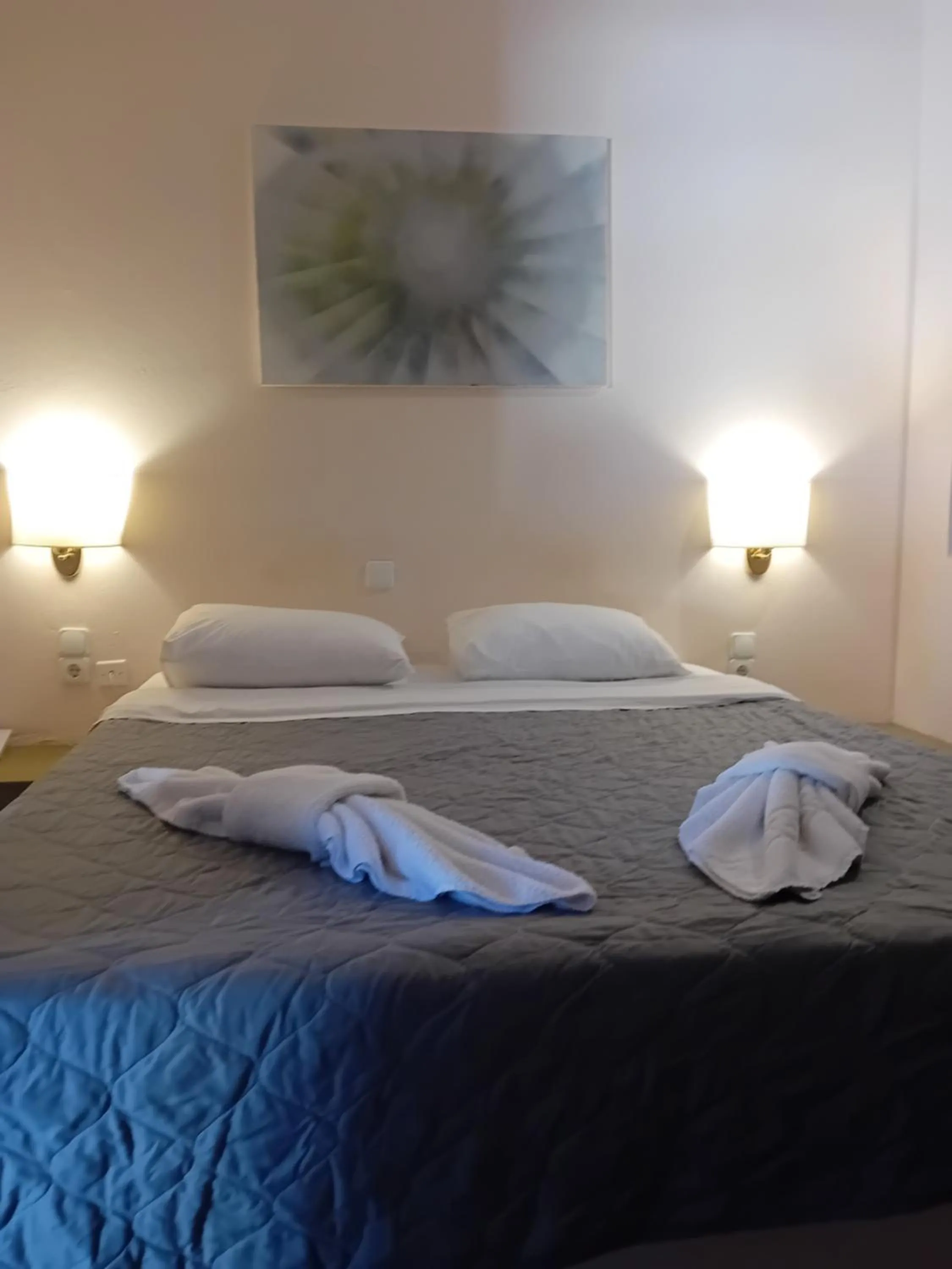 Bed in Heliotopos Apartments