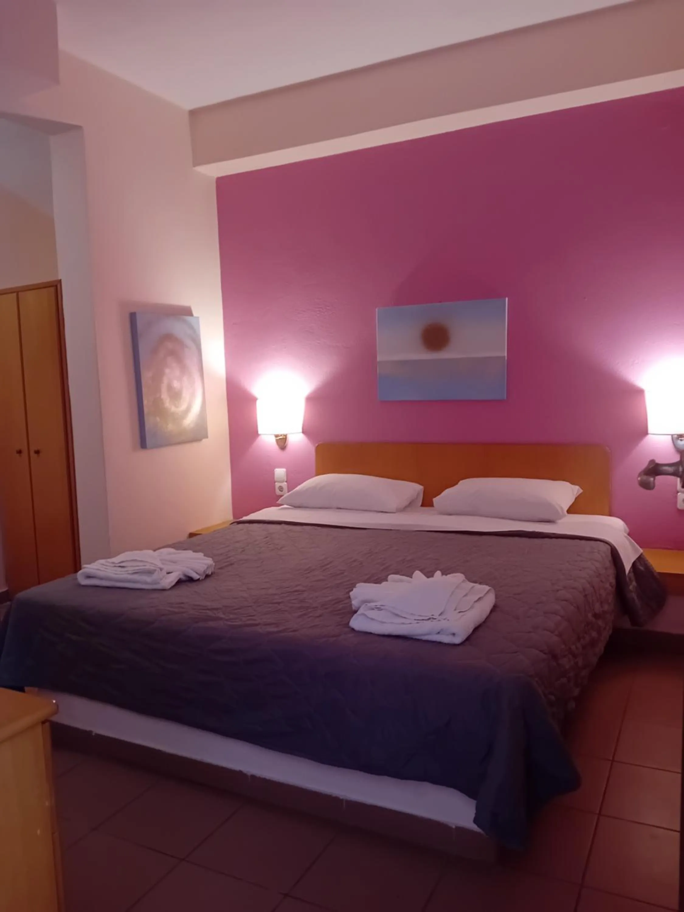 Bed in Heliotopos Apartments