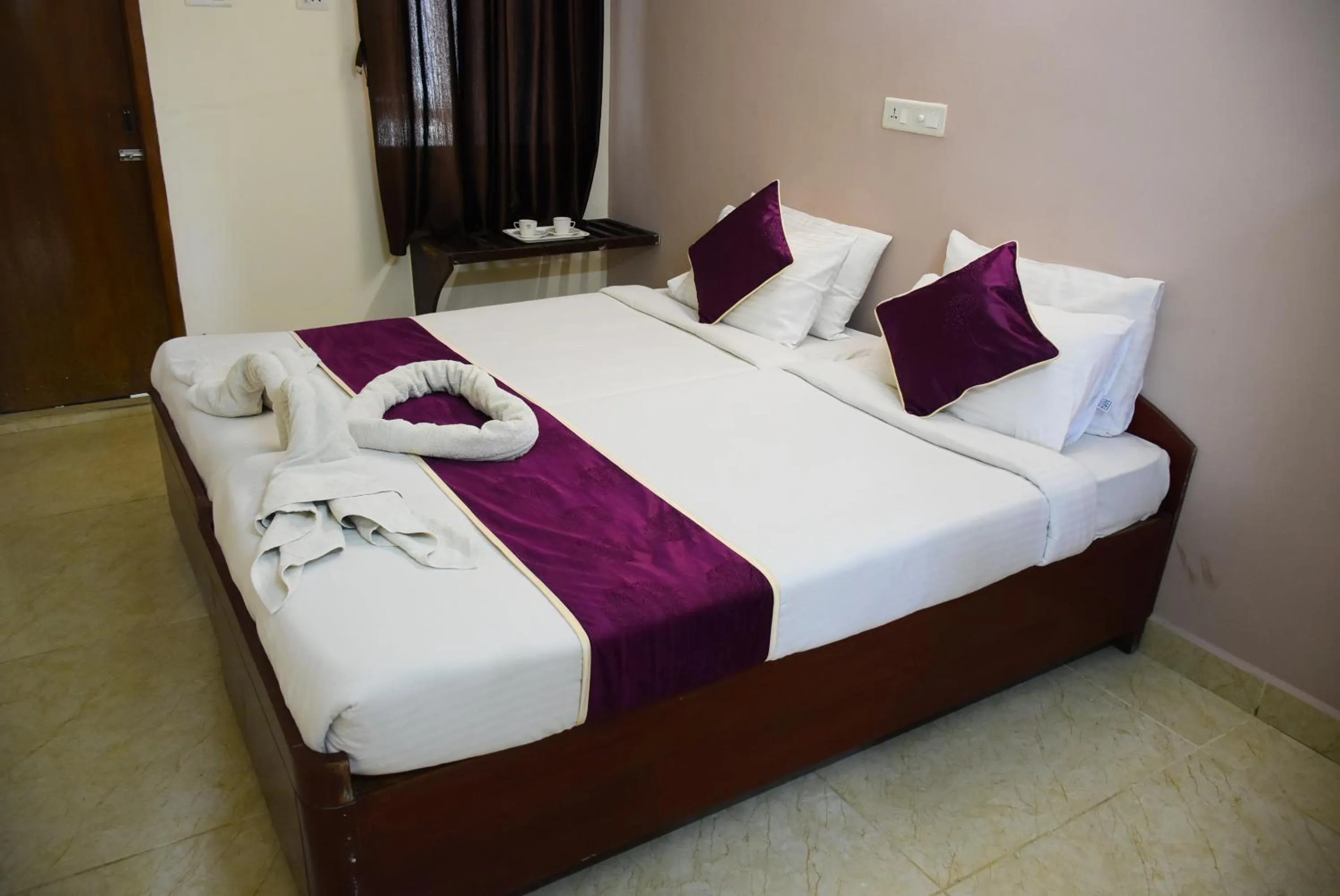 Bed in Naksha Tree Hotels Kishore Inn - Koyambedu