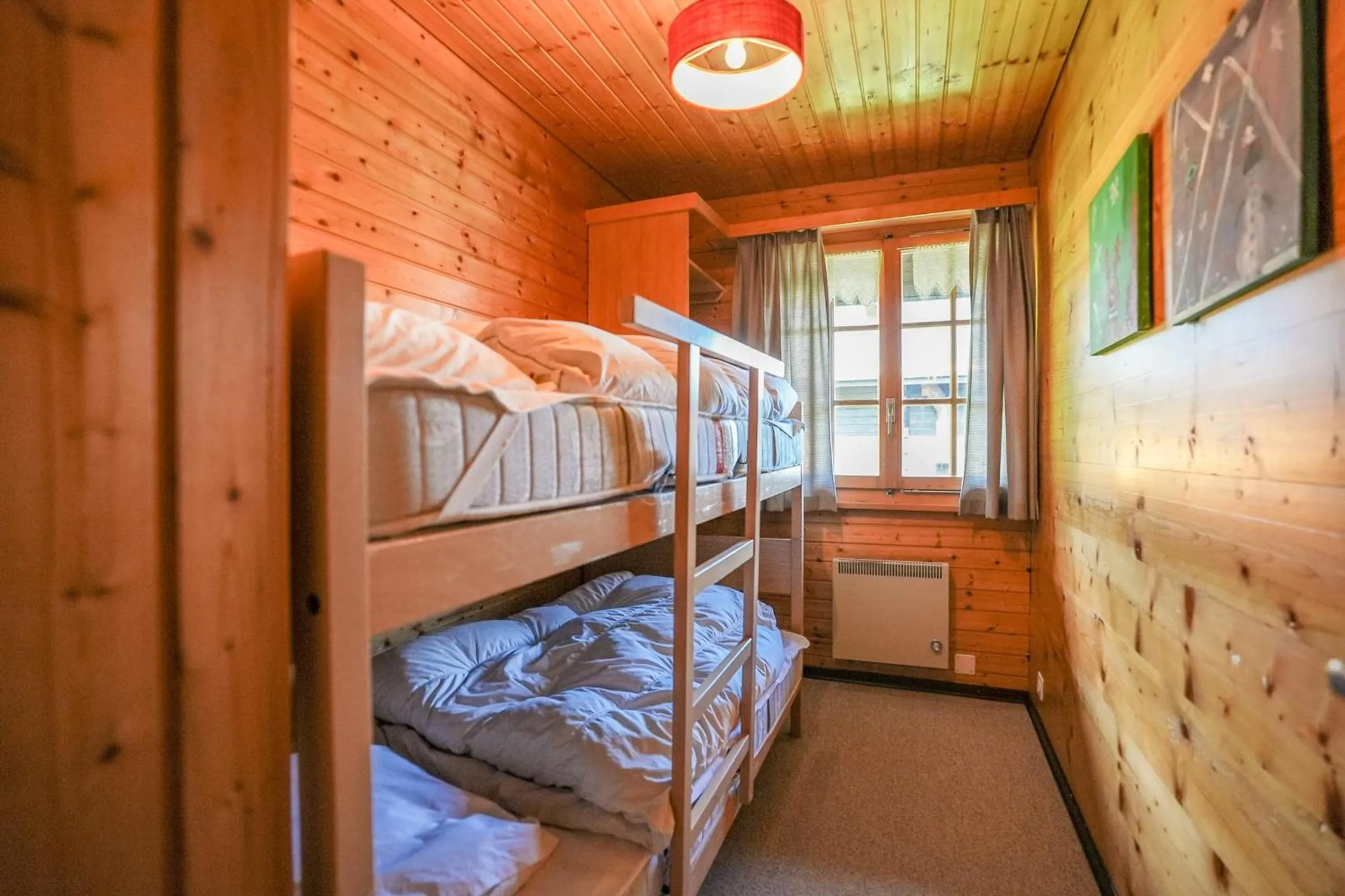 Bed in Chalet Lieke Apartment