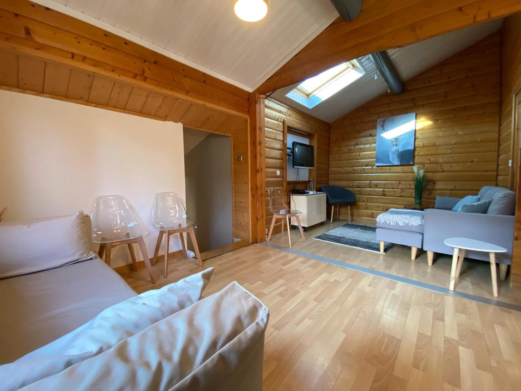Living room in Chalet les Bleuets 12p - babyfoot & Wii