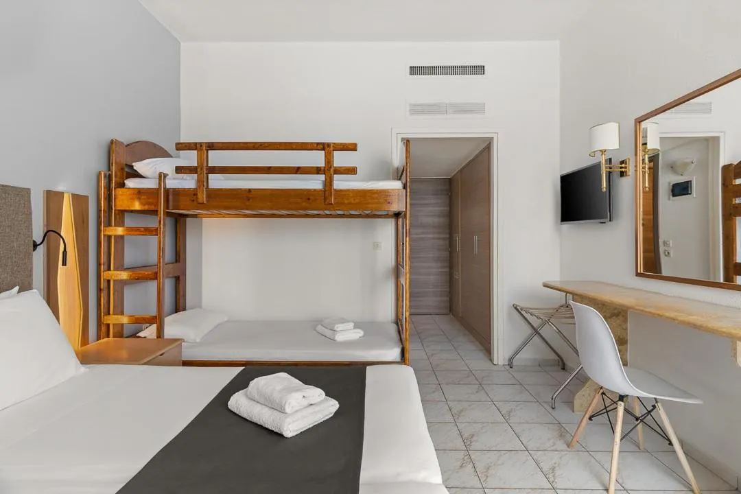 Bed in Palmariva Beach Hotel