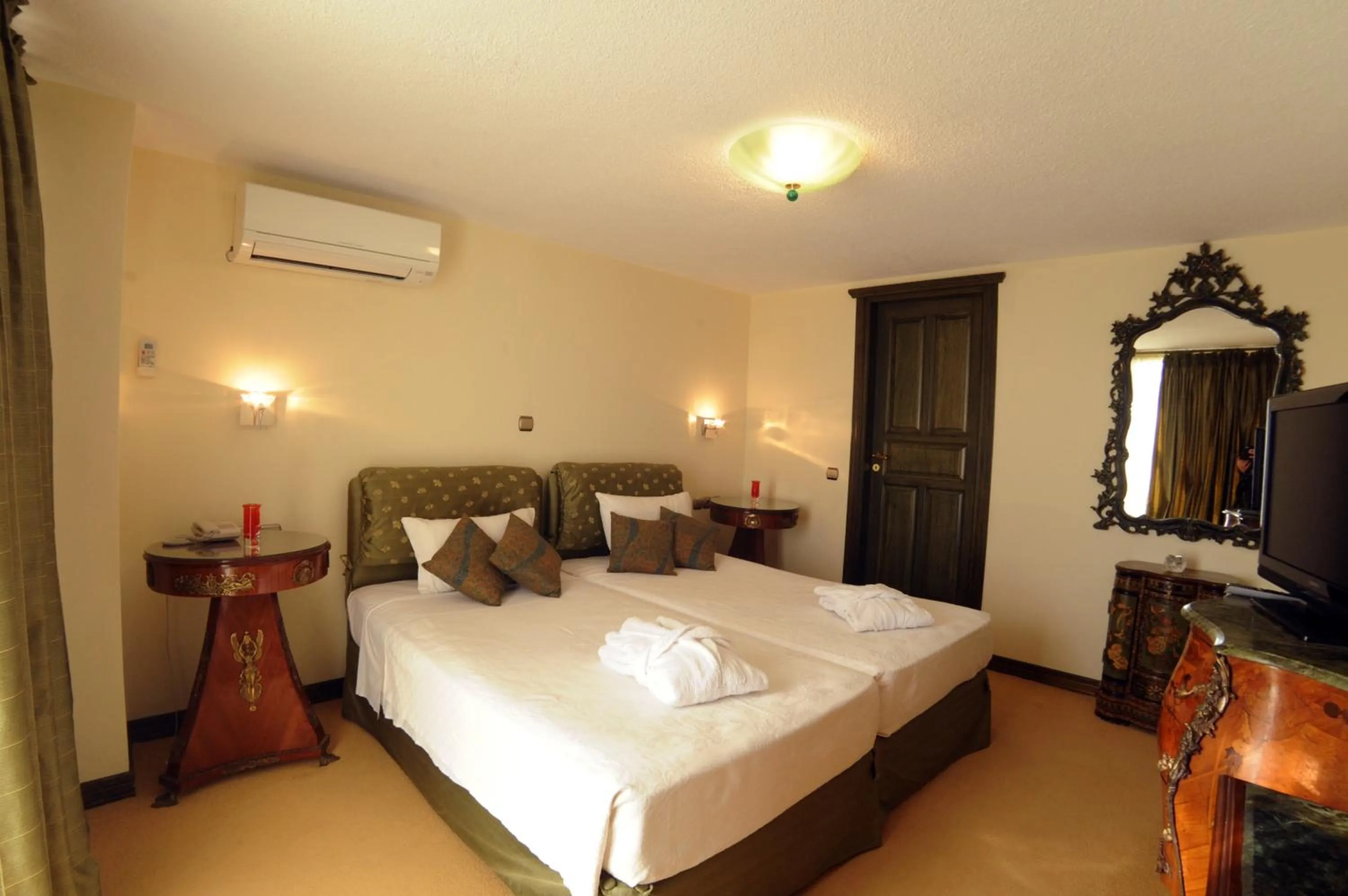 Bed in Palmariva Beach Hotel