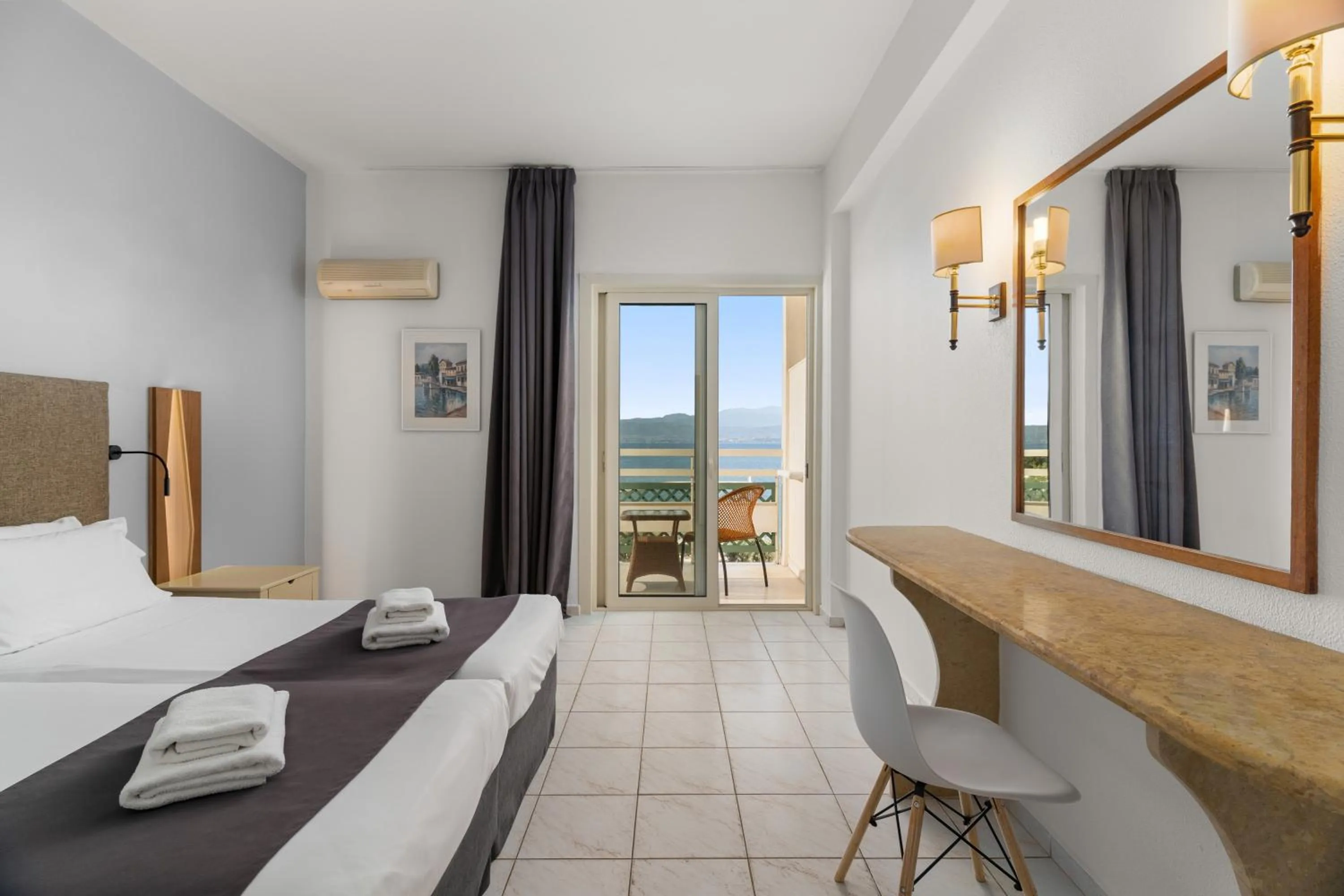 Bed in Palmariva Beach Hotel