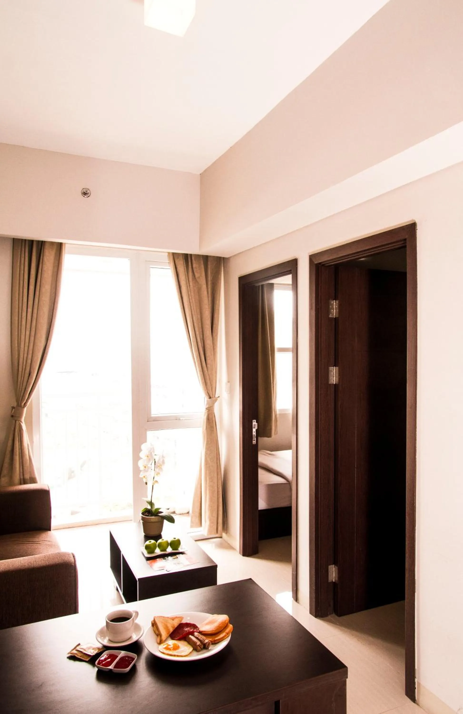 Living room, Bed in Skyland City Hotel Jatinangor