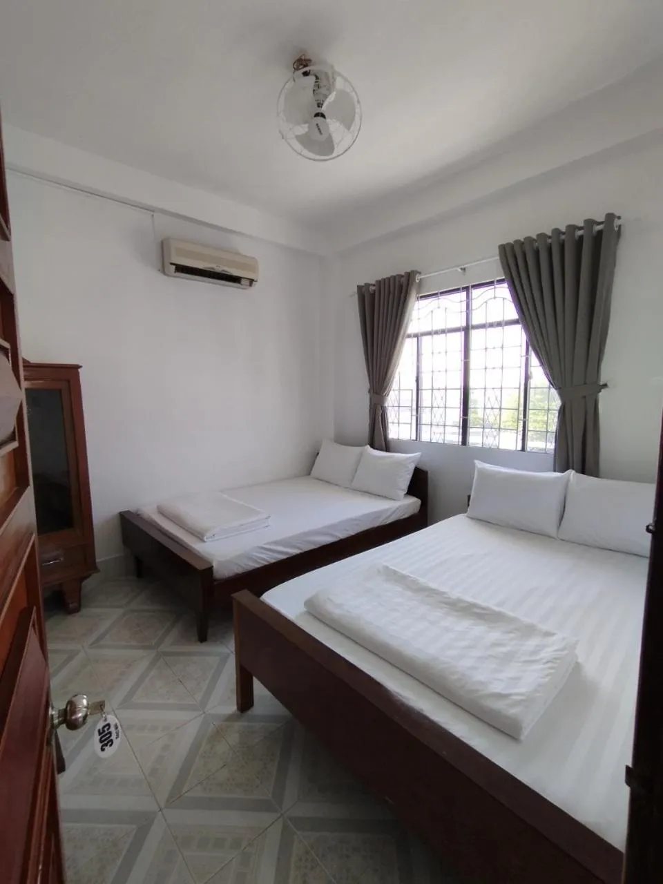 Bed in Nhà Nghỉ SAO MAI