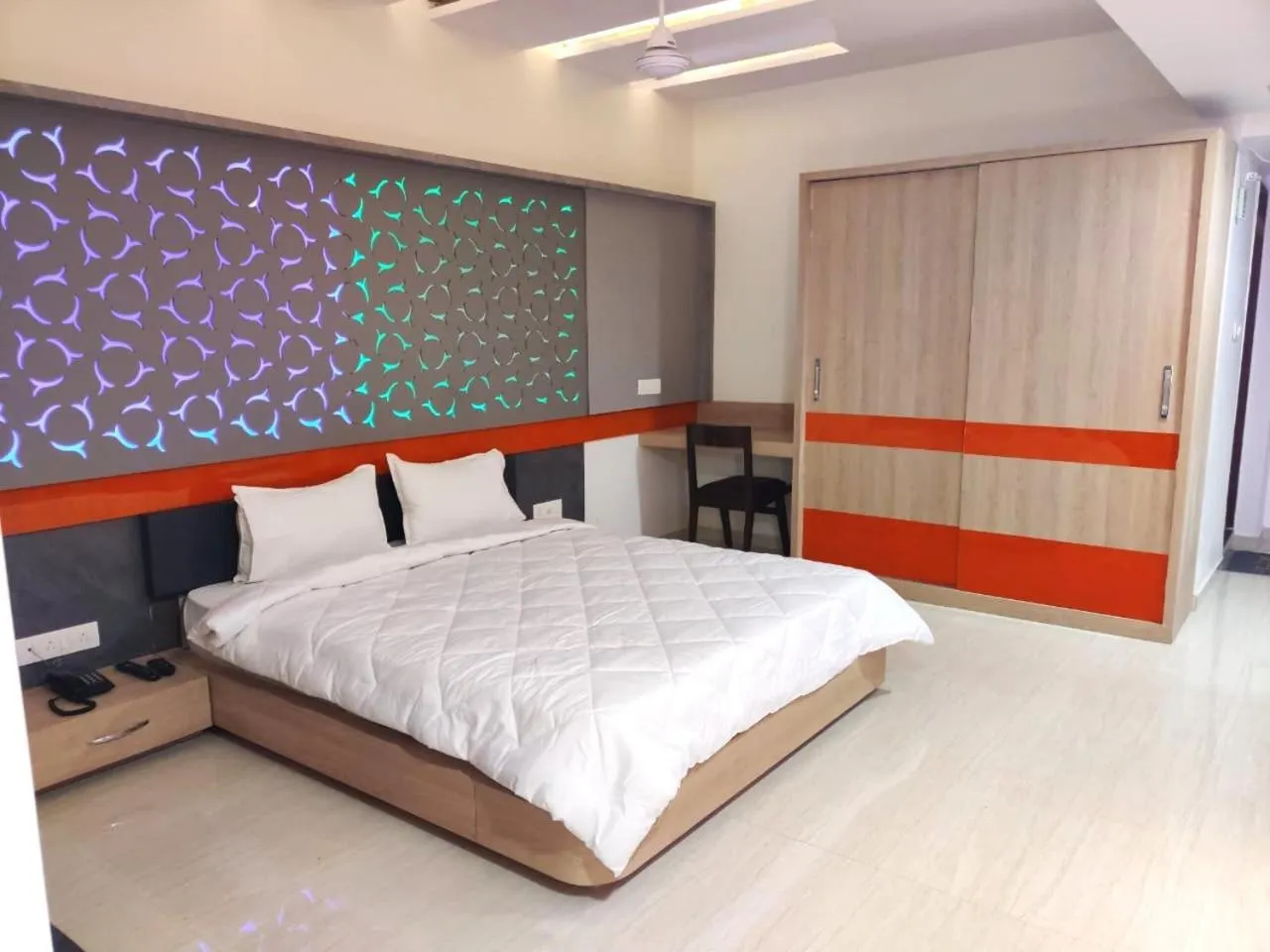 Bed in The Grand Takshak Hotel