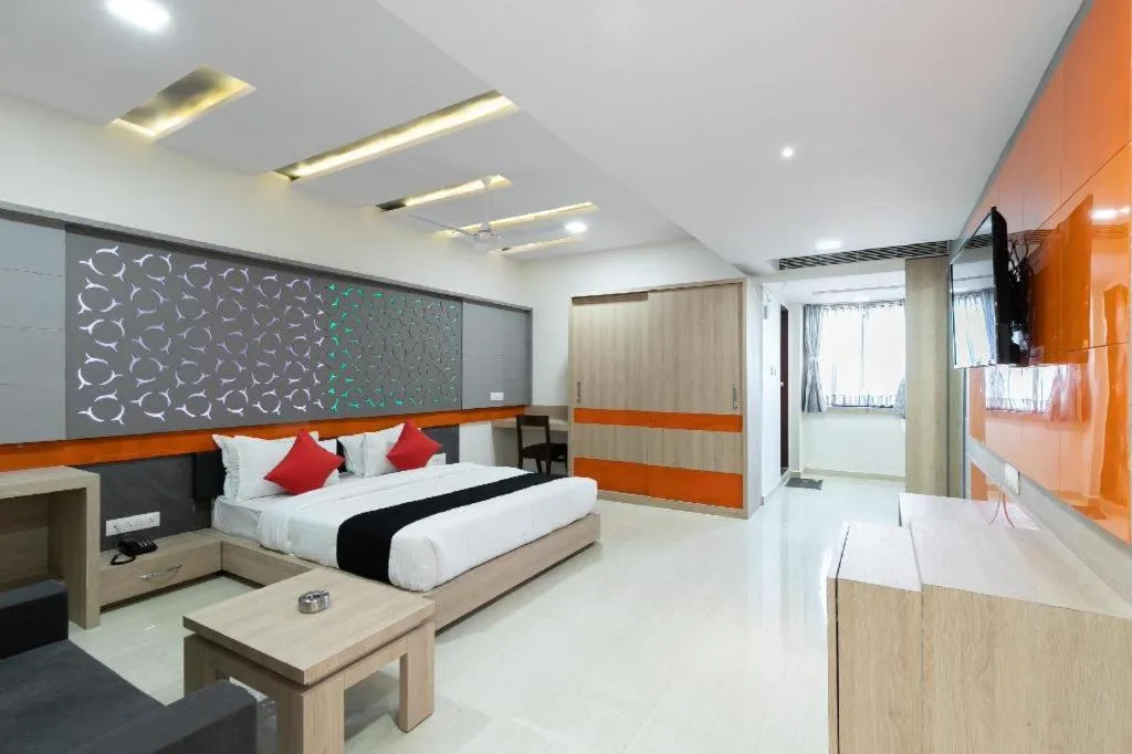 Bed in The Grand Takshak Hotel