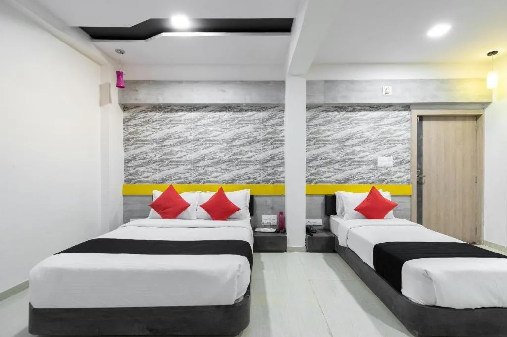 Bed in The Grand Takshak Hotel