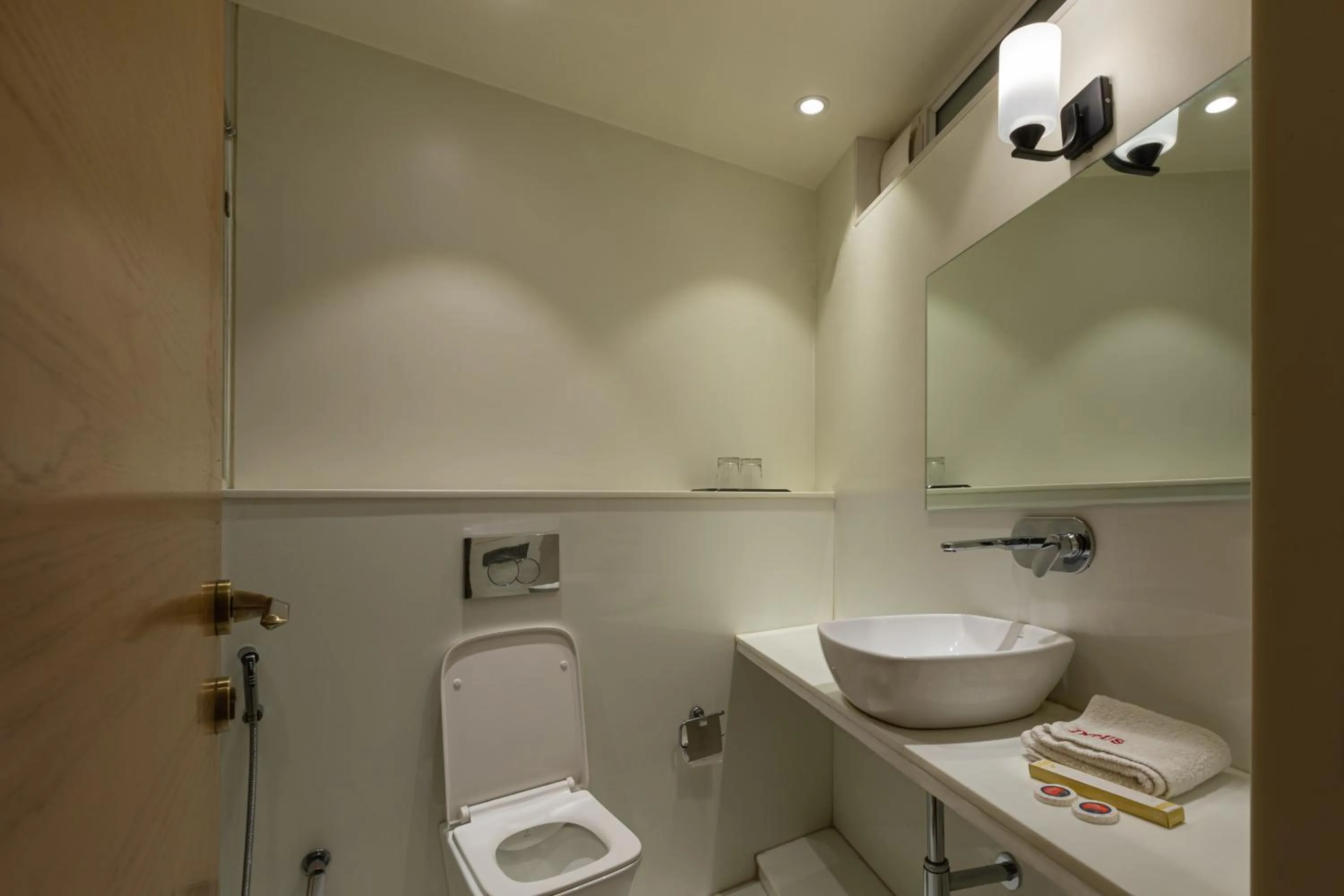 Toilet in Indus Suites