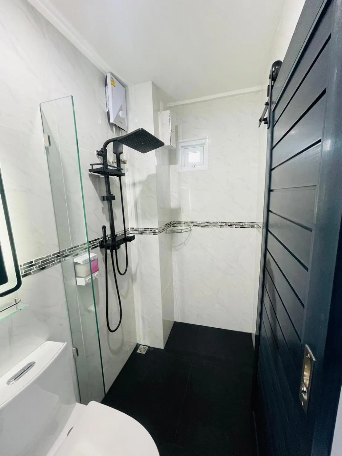 Shower in Thonglor Suites Hotel