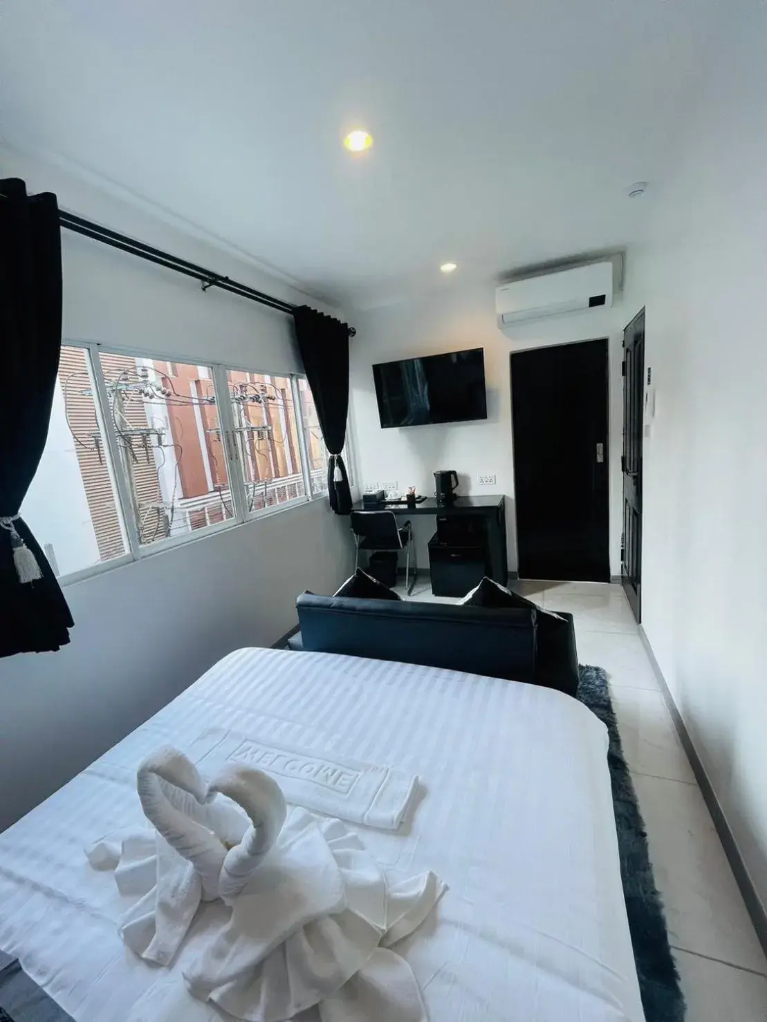 Bed in Thonglor Suites Hotel Bed in Thonglor Suites Hotel