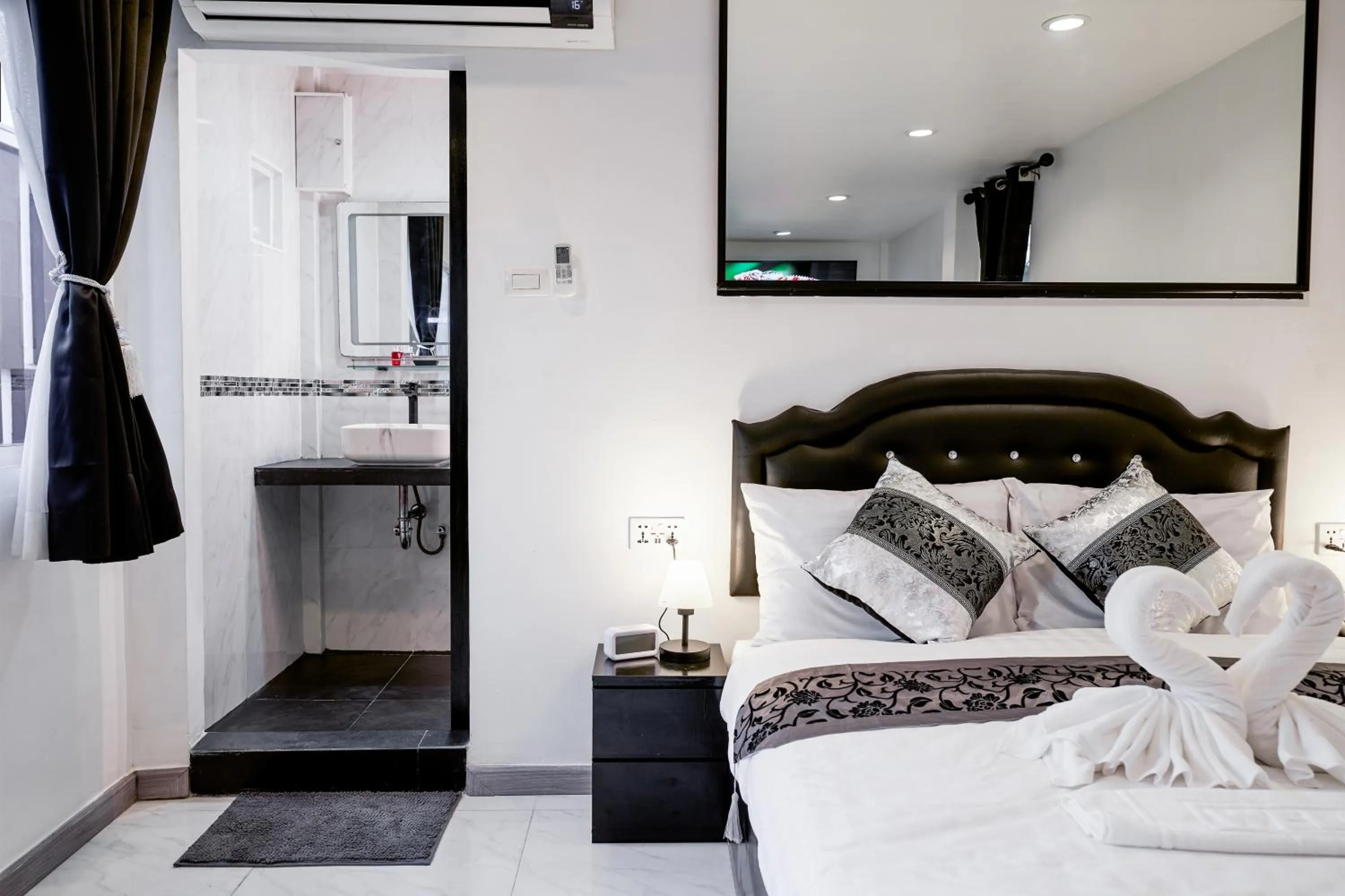 Bed in Thonglor Suites Hotel