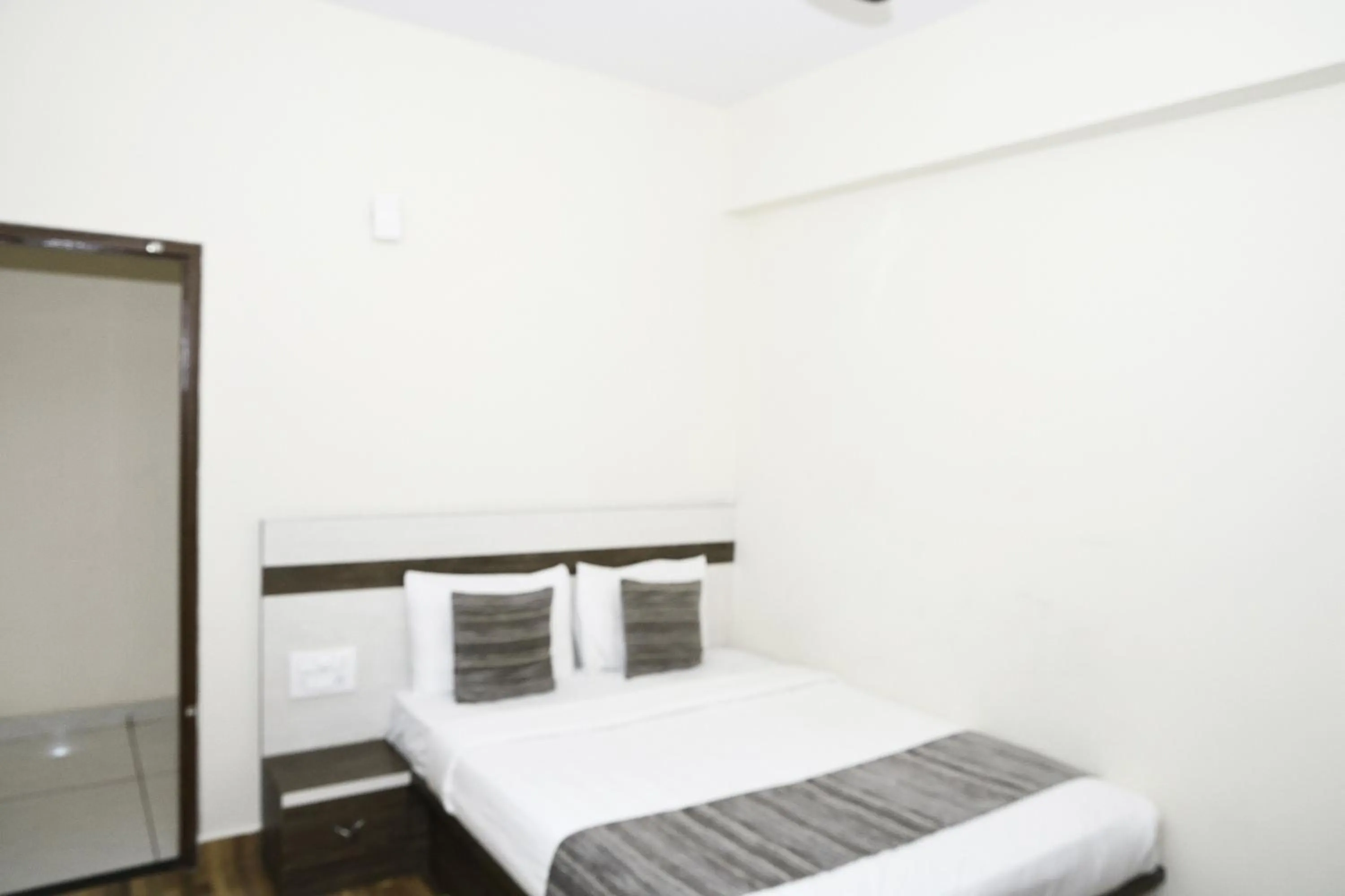 Bed in Hotel JP Grand