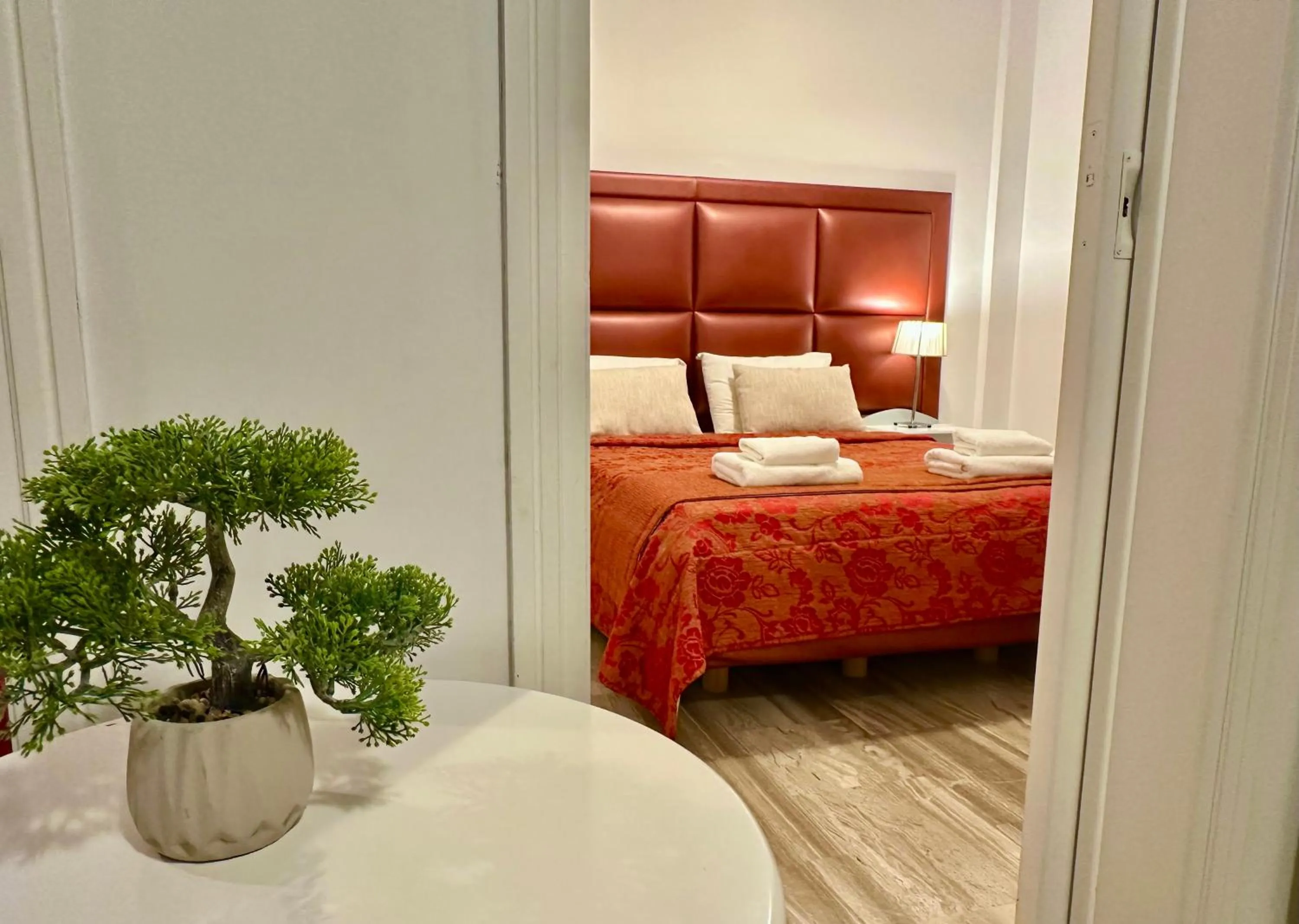 Bed in Hotel Apartments Panorama