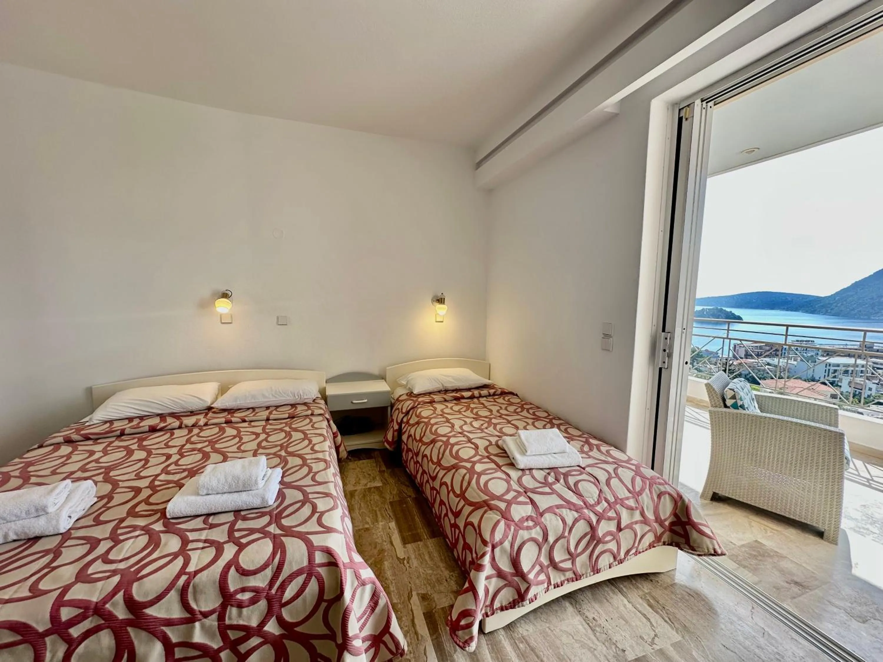 Bed in Hotel Apartments Panorama