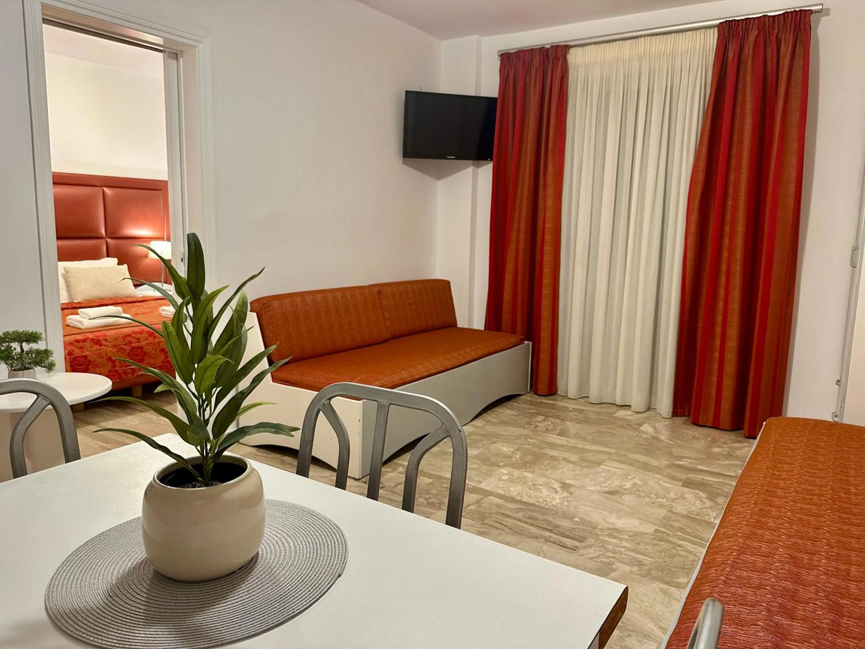 Bed in Hotel Apartments Panorama