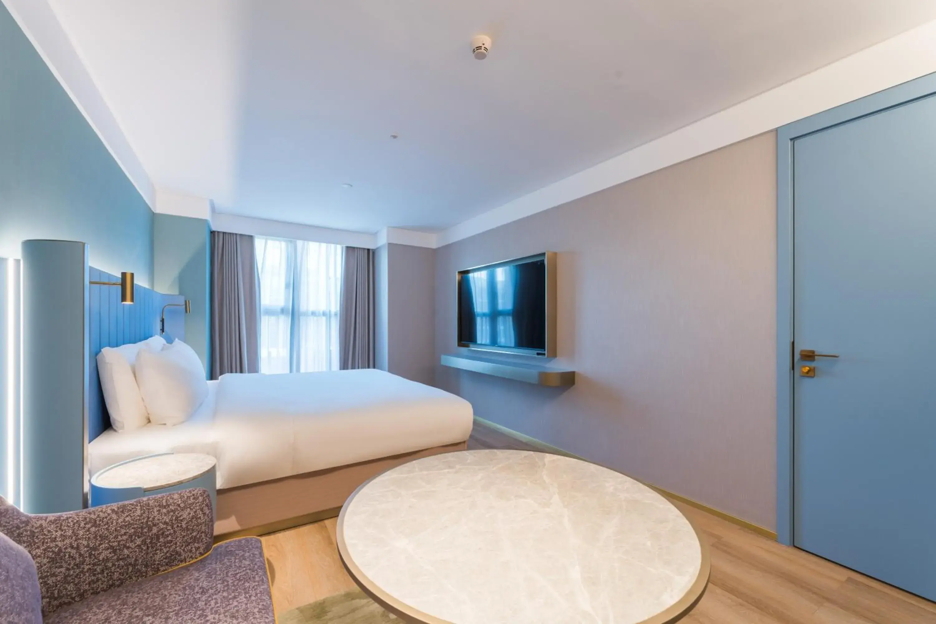 Bed in Manxin Hotel Guangzhou Baiyun Airport Branch Bed in Manxin Hotel Guangzhou Baiyun Airport Branch