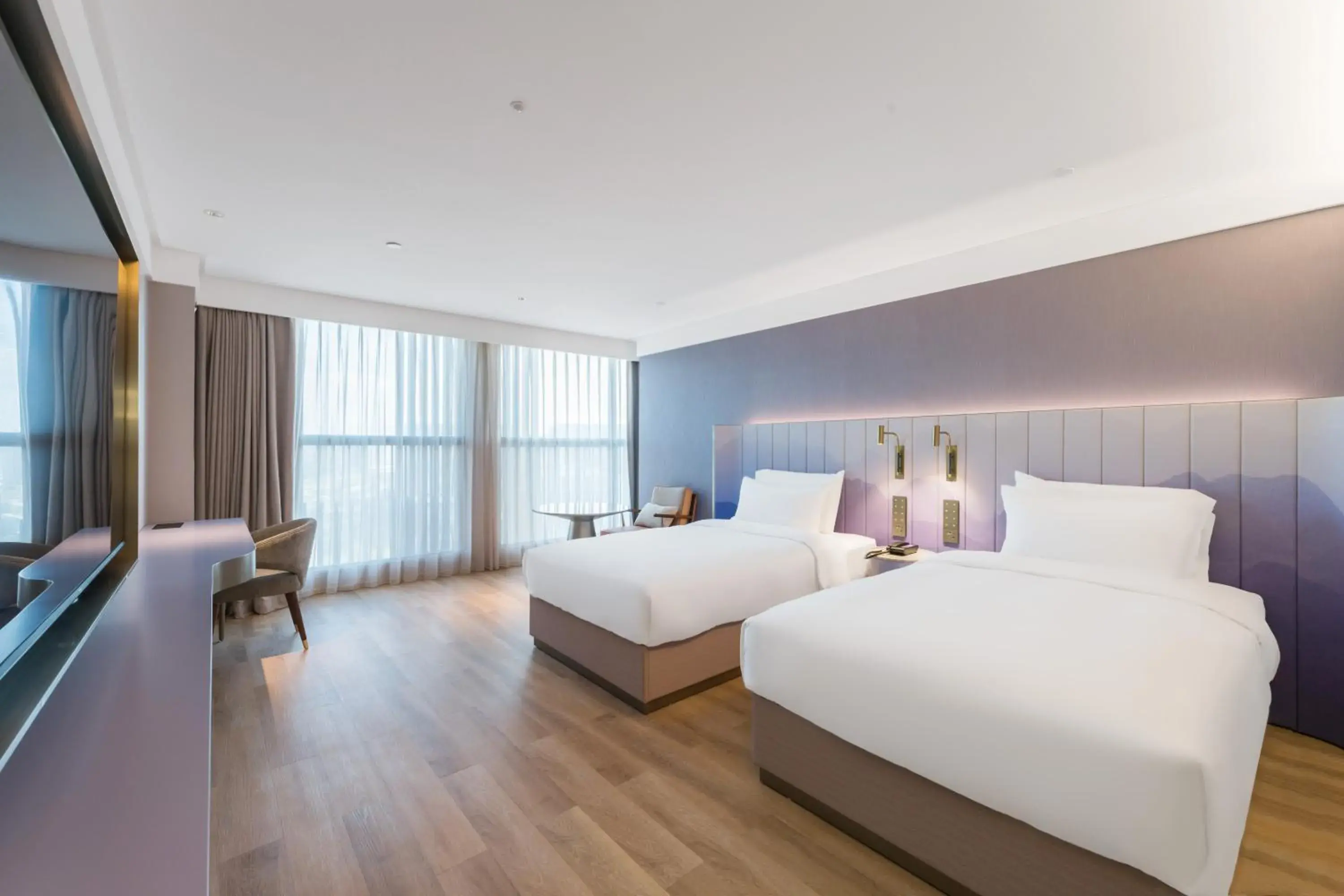 Bed in Manxin Hotel Guangzhou Baiyun Airport Branch Bed in Manxin Hotel Guangzhou Baiyun Airport Branch