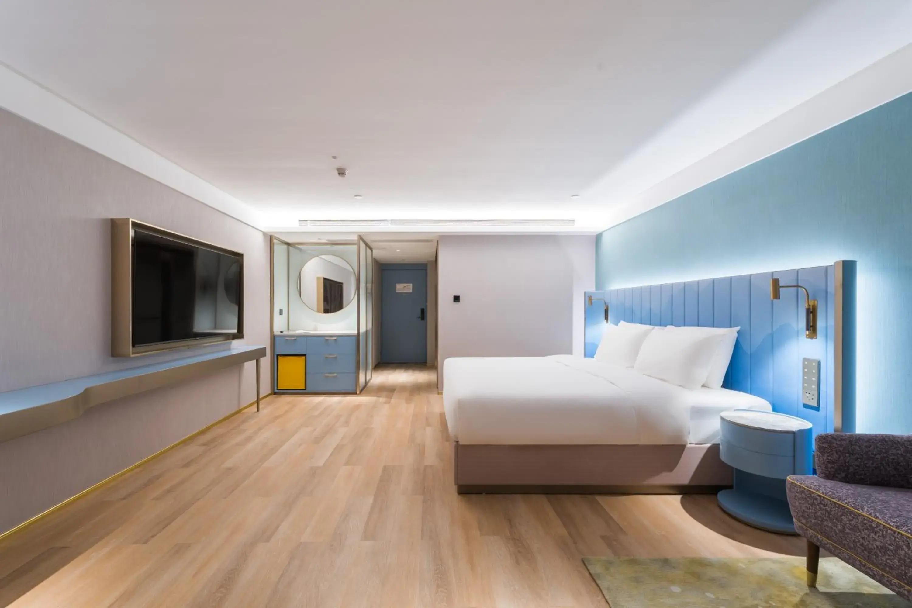 Bed in Manxin Hotel Guangzhou Baiyun Airport Branch Bed in Manxin Hotel Guangzhou Baiyun Airport Branch