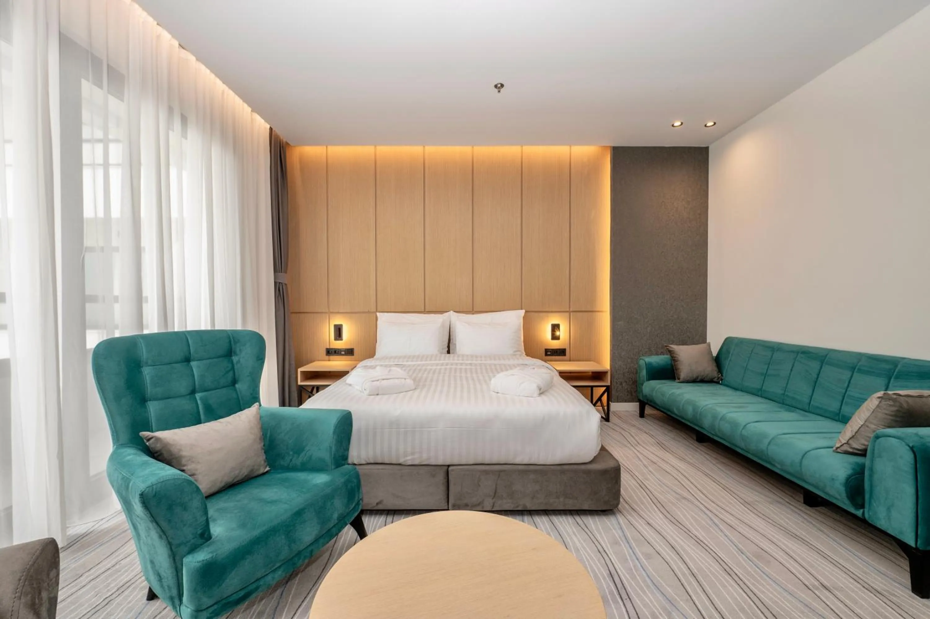 Bed in The Grandeur Hotel