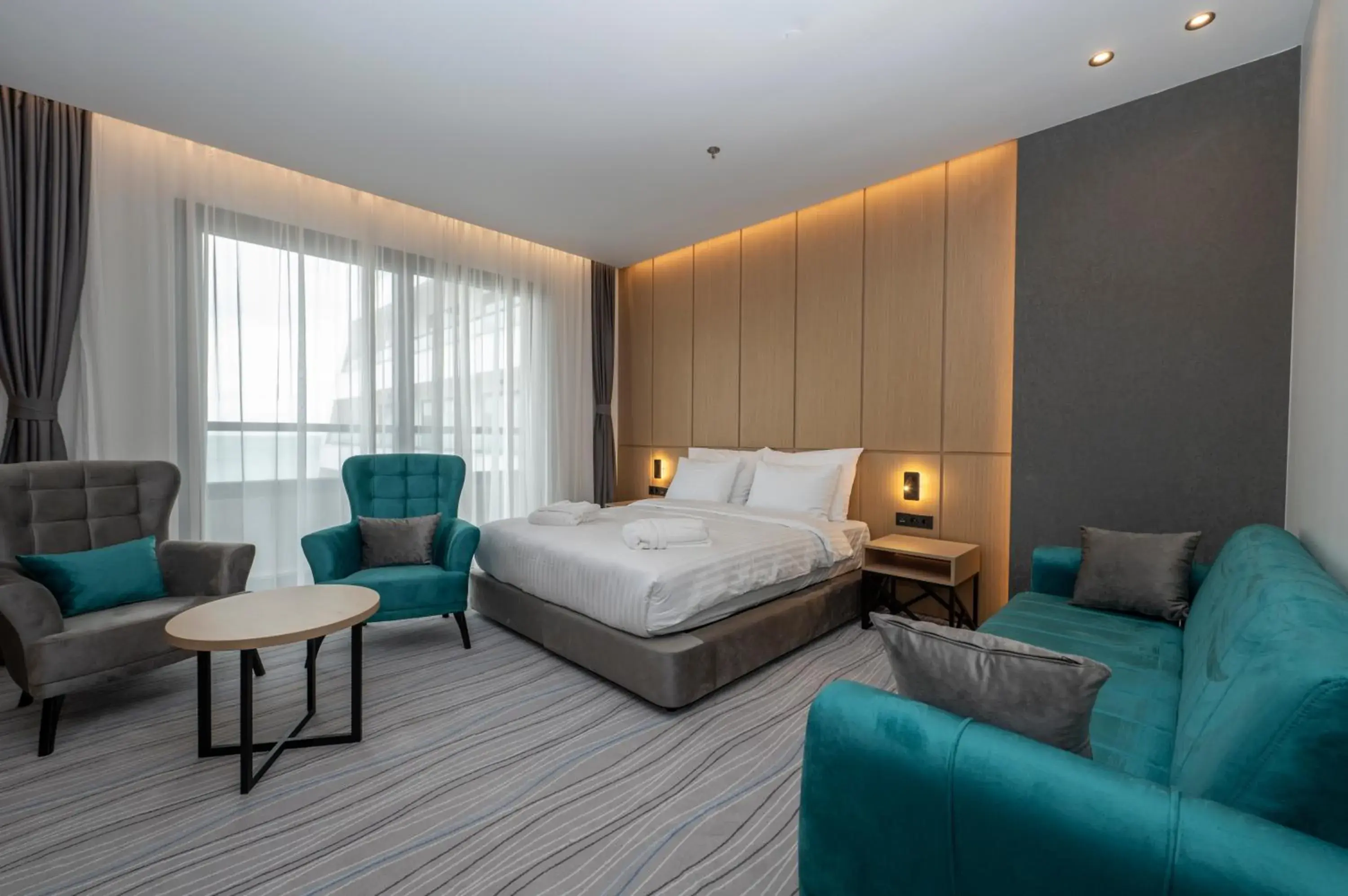 Bed in The Grandeur Hotel Bed in The Grandeur Hotel