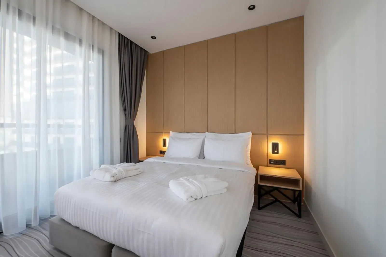 Bed in The Grandeur Hotel Bed in The Grandeur Hotel