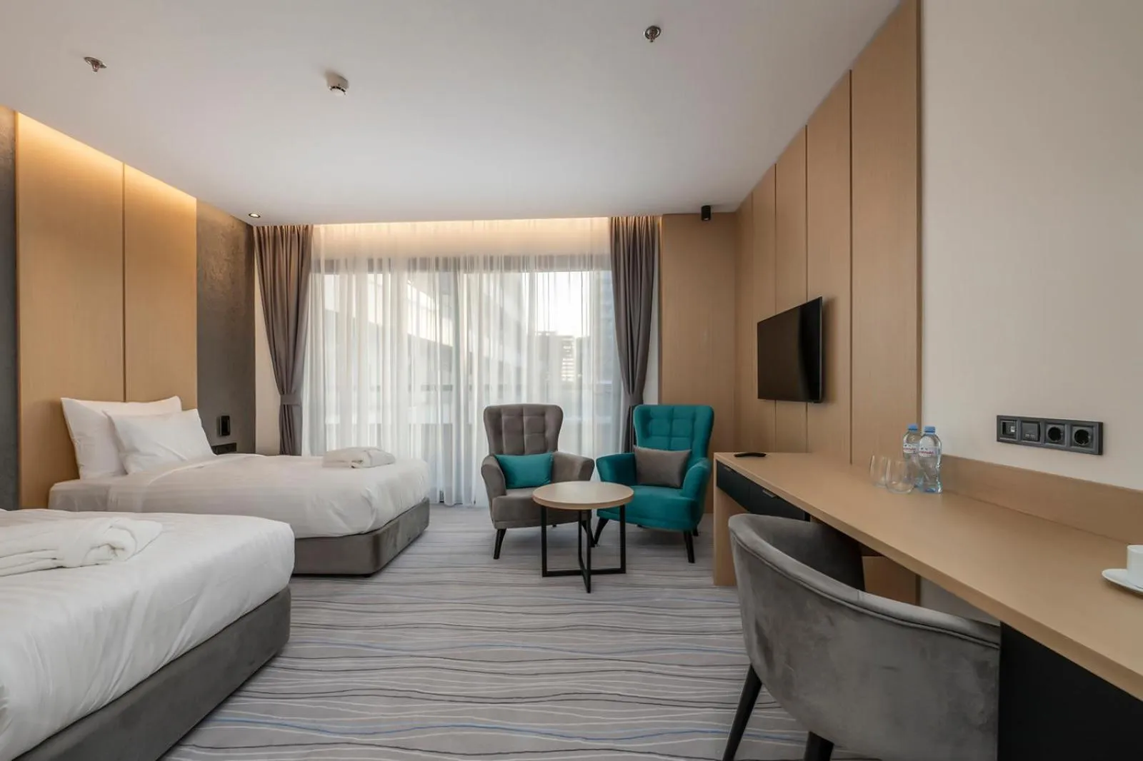 Bed in The Grandeur Hotel