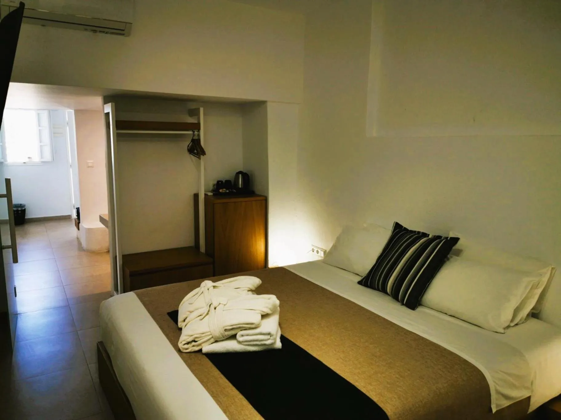 Bed in Muses Cycladic Suites