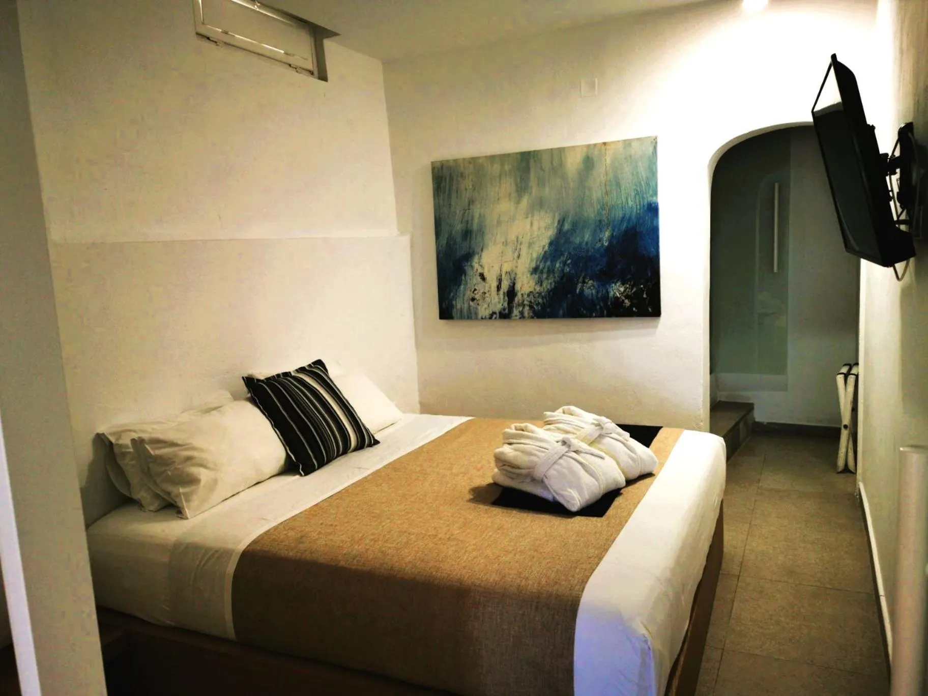 Bed in Muses Cycladic Suites