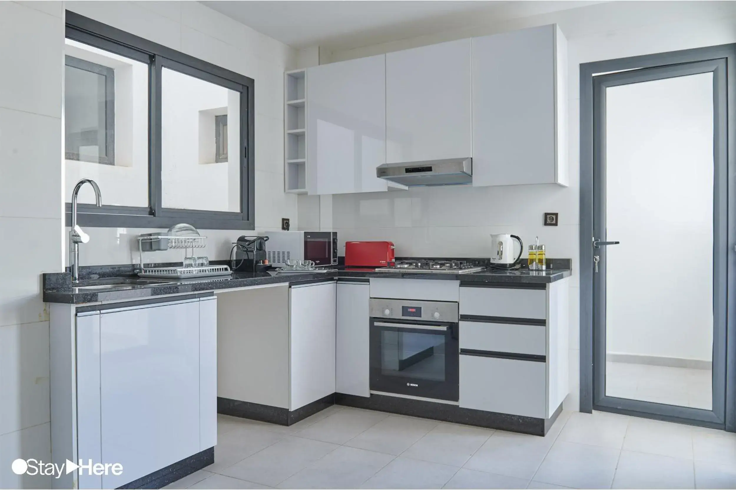 kitchen in Stayhere Rabat - Hay Riad - Sophisticated Residence kitchen in Stayhere Rabat - Hay Riad - Sophisticated Residence