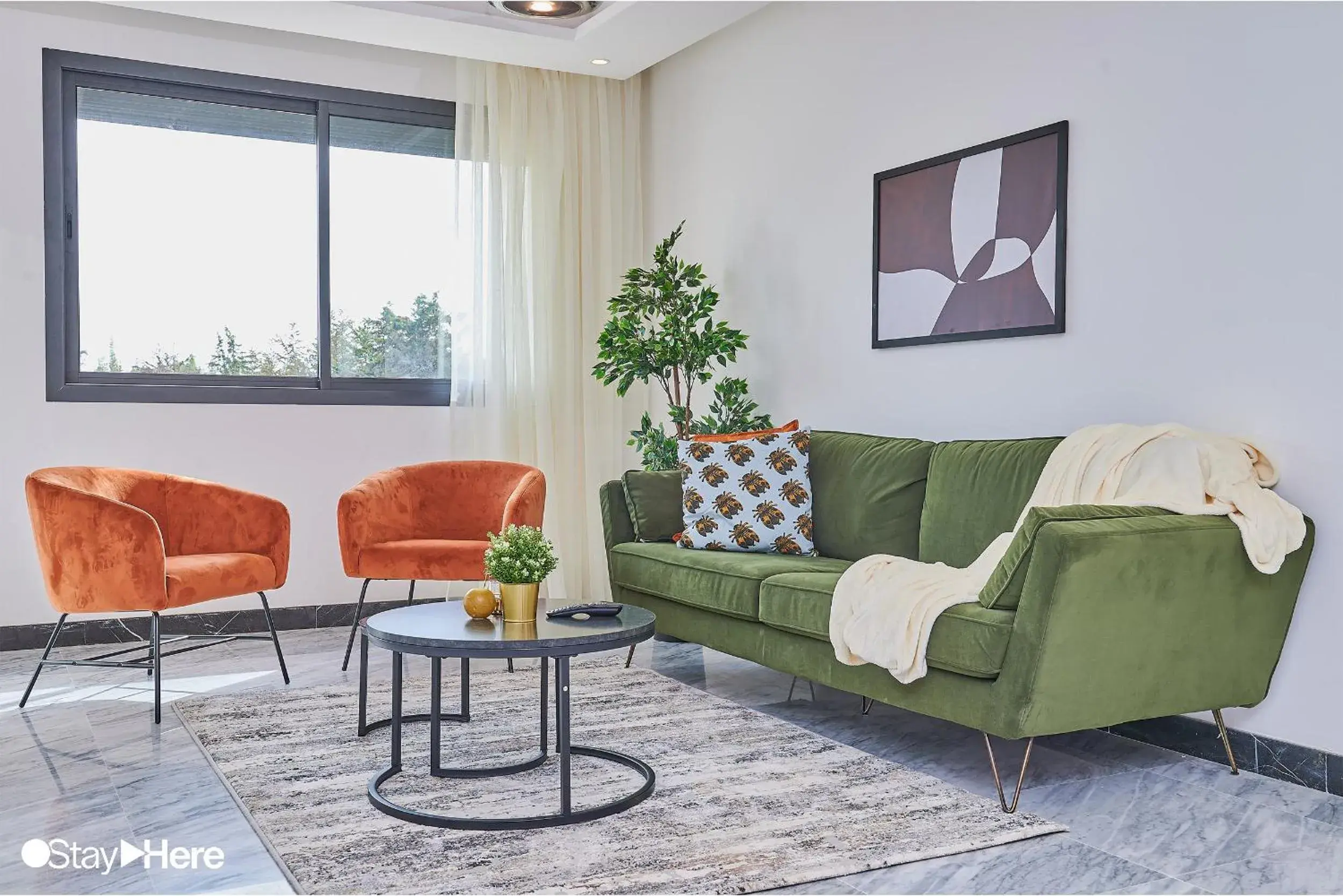 Living room in Stayhere Rabat - Hay Riad - Sophisticated Residence Living room in Stayhere Rabat - Hay Riad - Sophisticated Residence