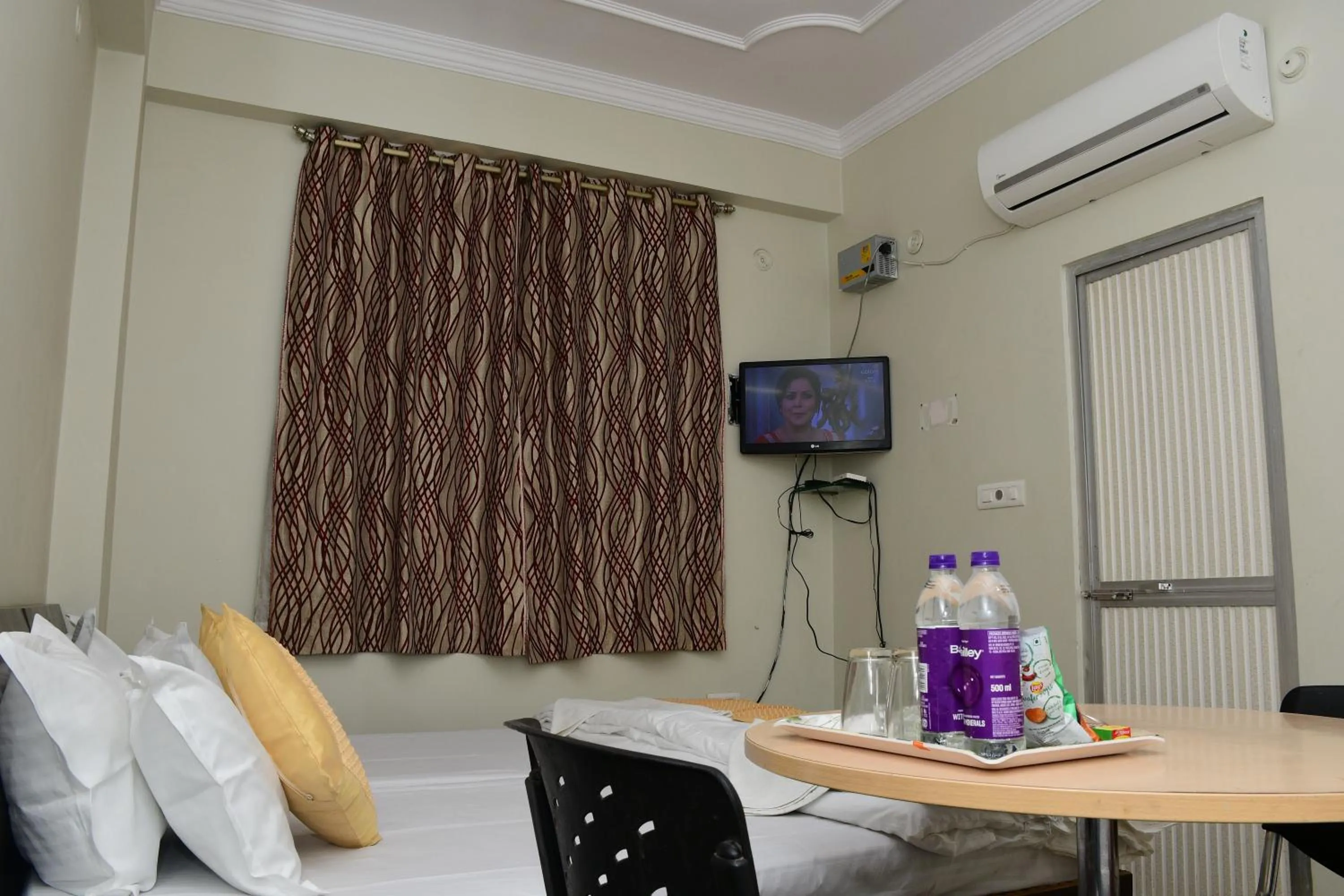 Bed in Hotel Buddha International