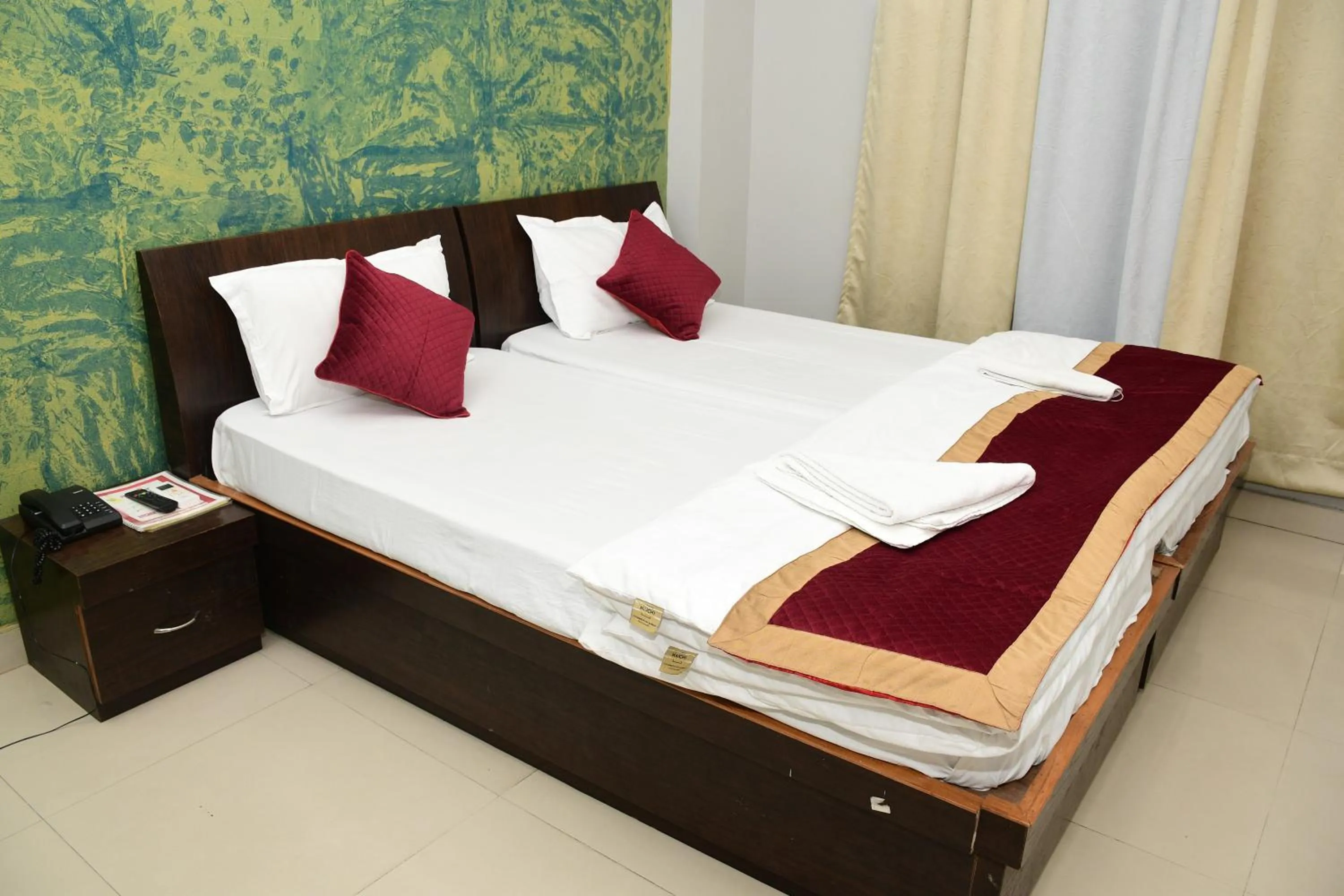 Bed in Hotel Buddha International