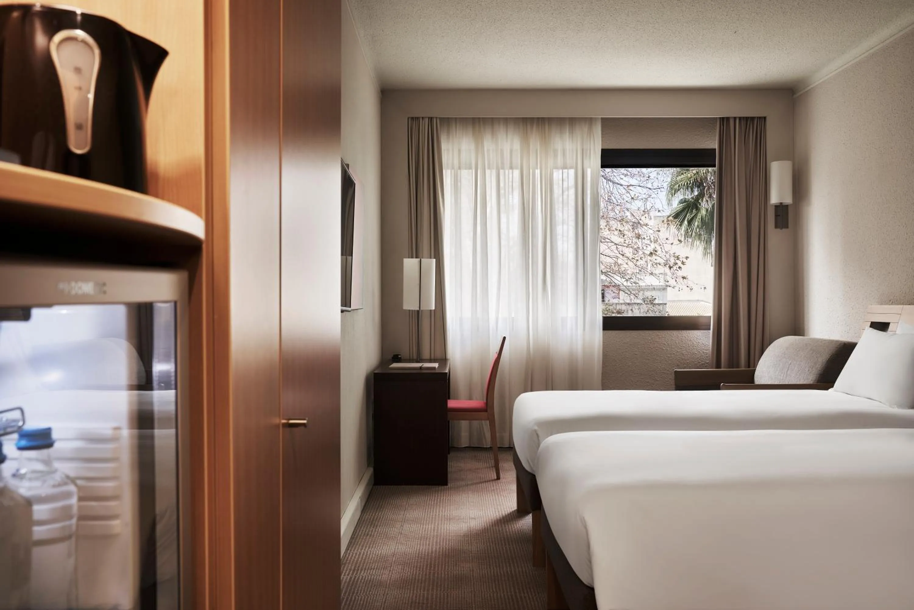 View (from property/room), Bed in Novotel Athens