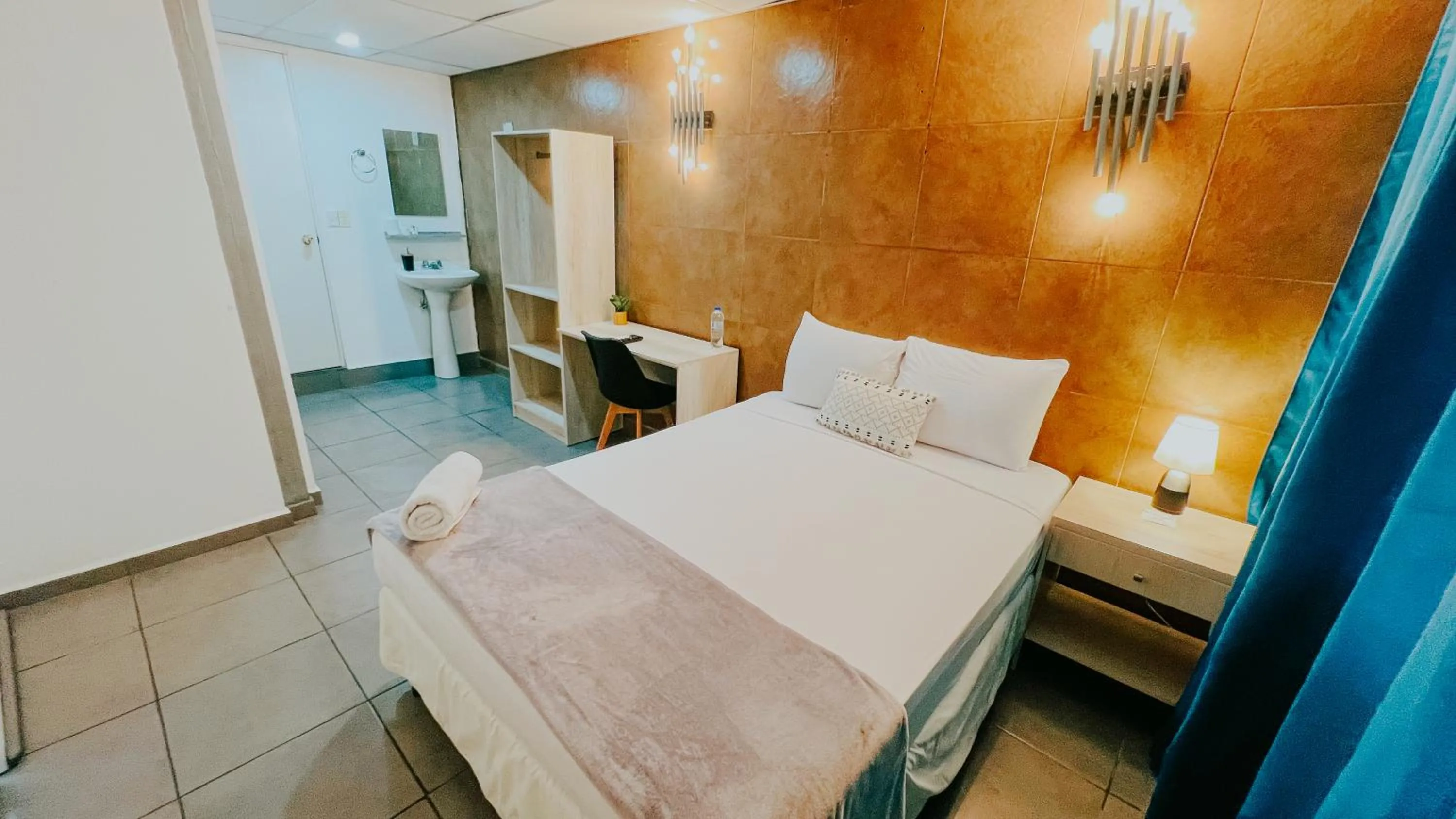 Bed in LA RUTA HOTEL CORPORATIVO