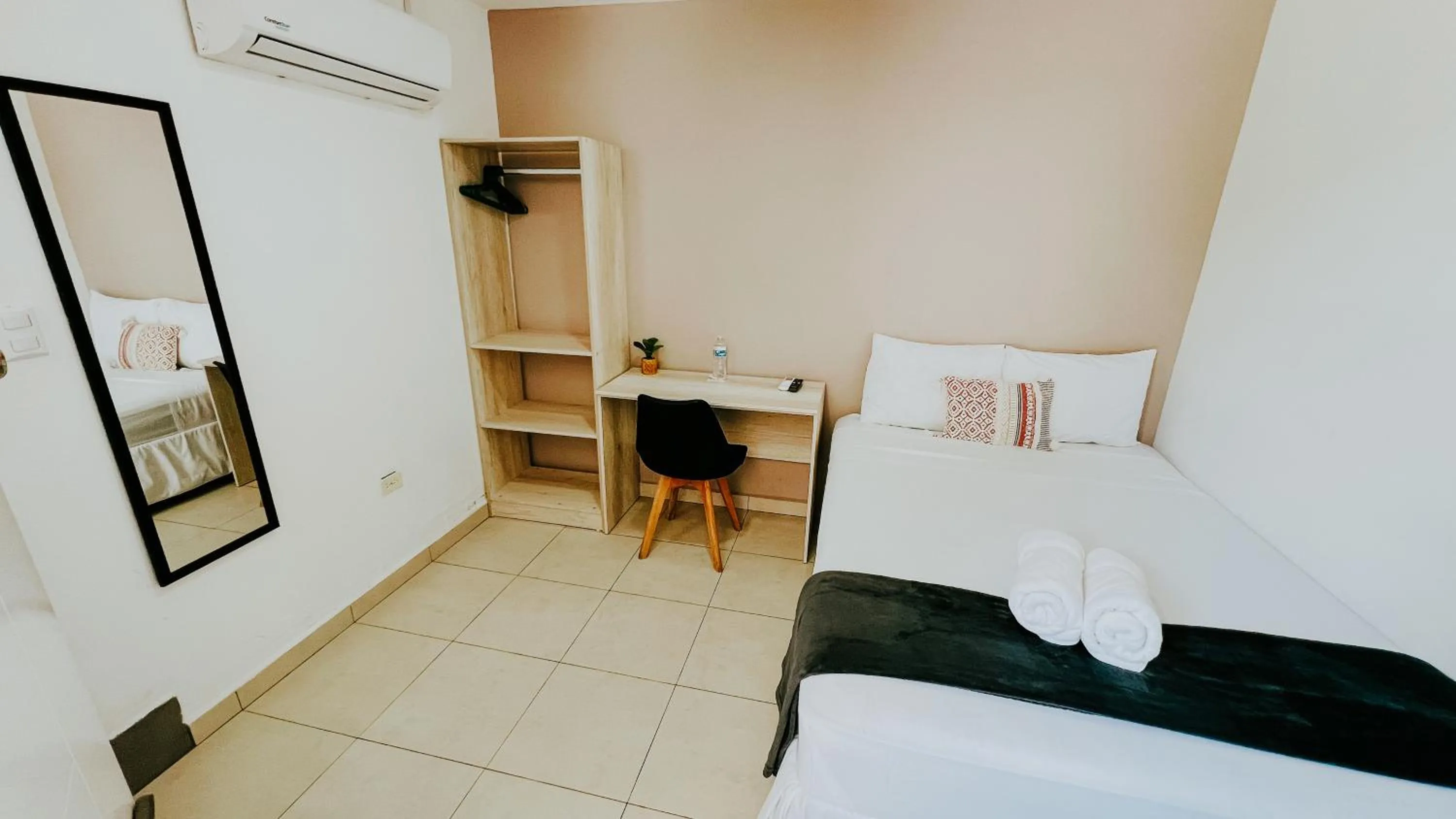 Bed in LA RUTA HOTEL CORPORATIVO