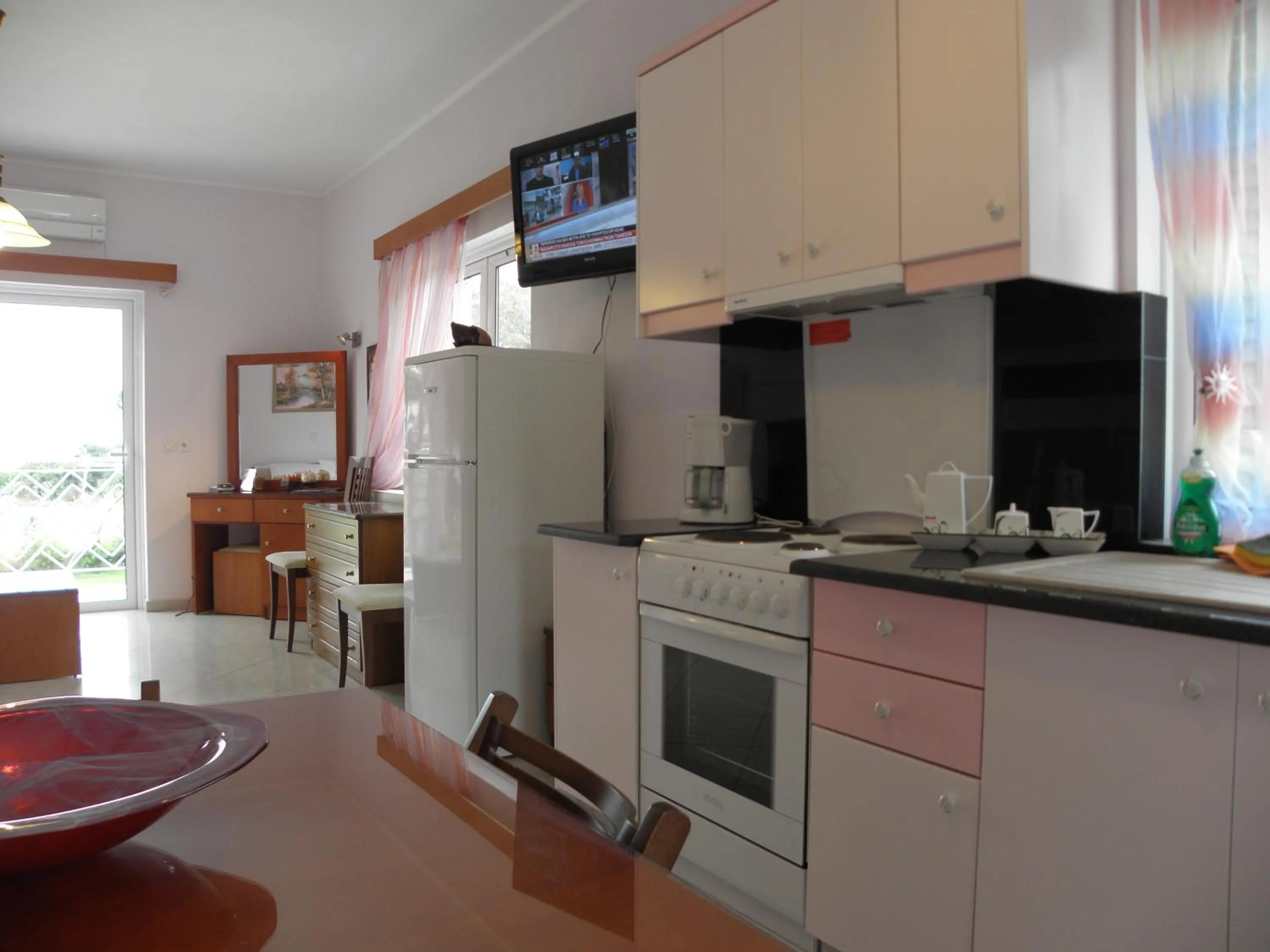 TV and multimedia in Irida Beach Resort Suites