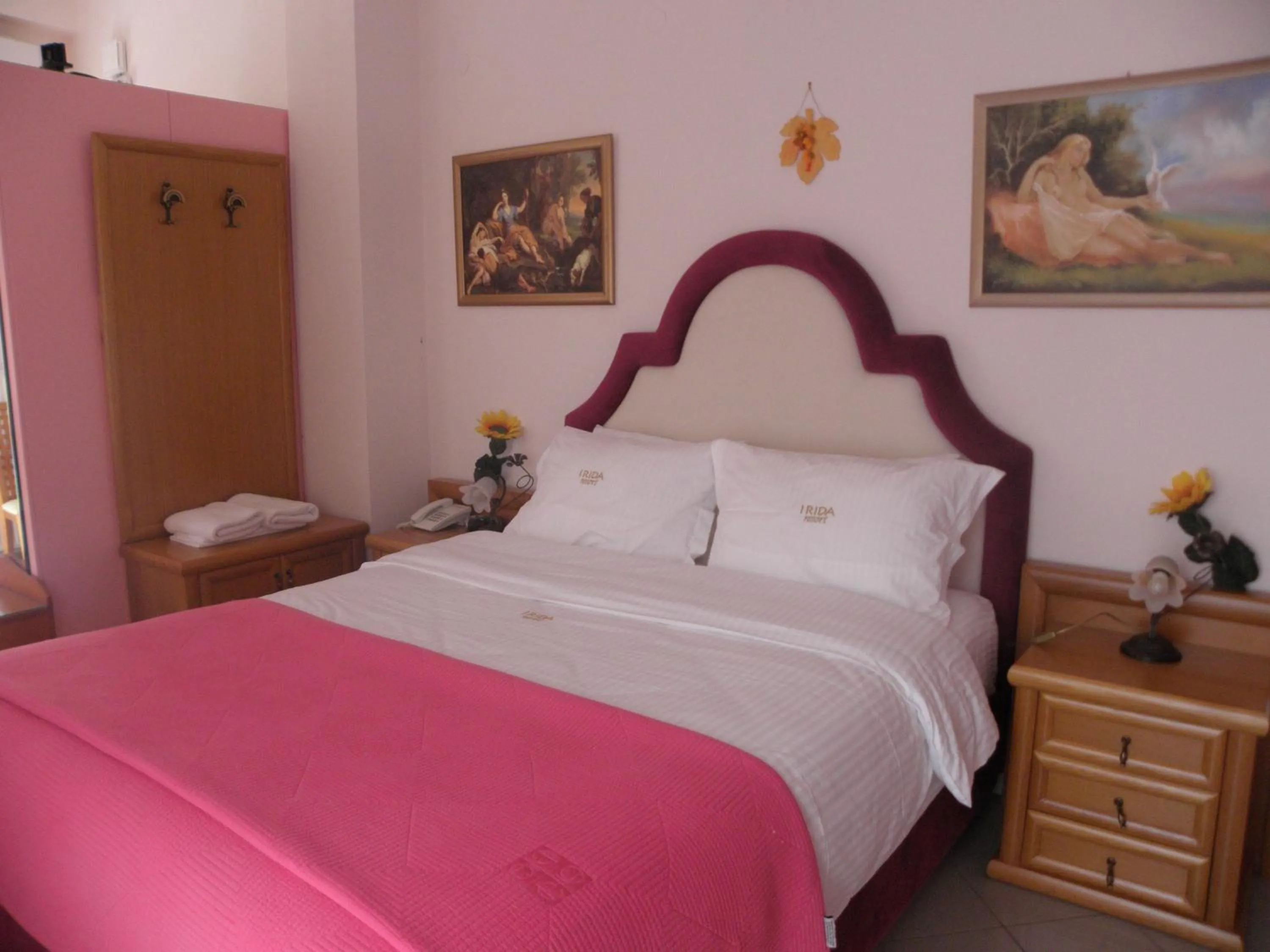 Bed in Irida Beach Resort Suites