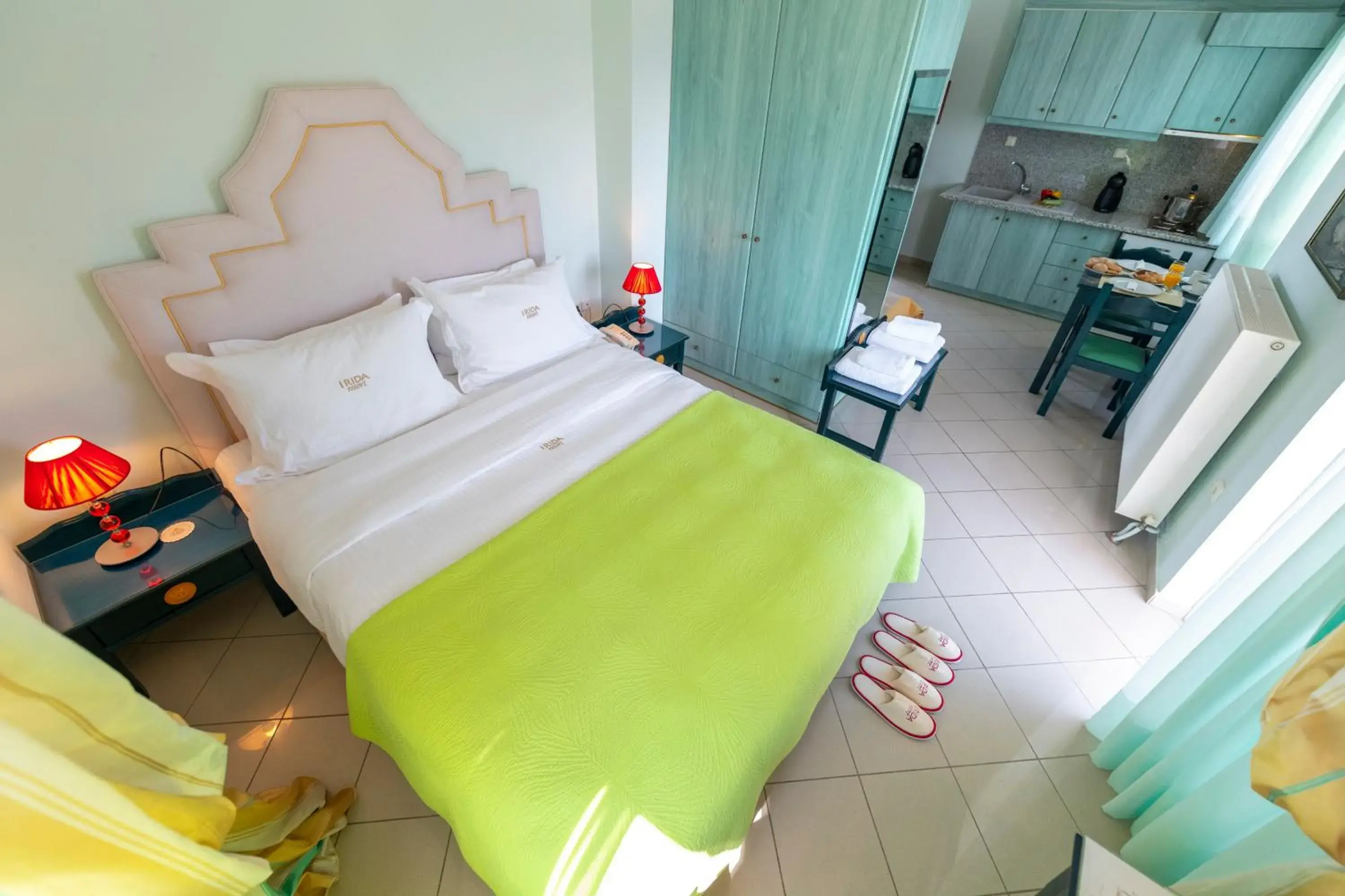 Kitchen or kitchenette, Bed in Irida Beach Resort Suites Kitchen or kitchenette, Bed in Irida Beach Resort Suites