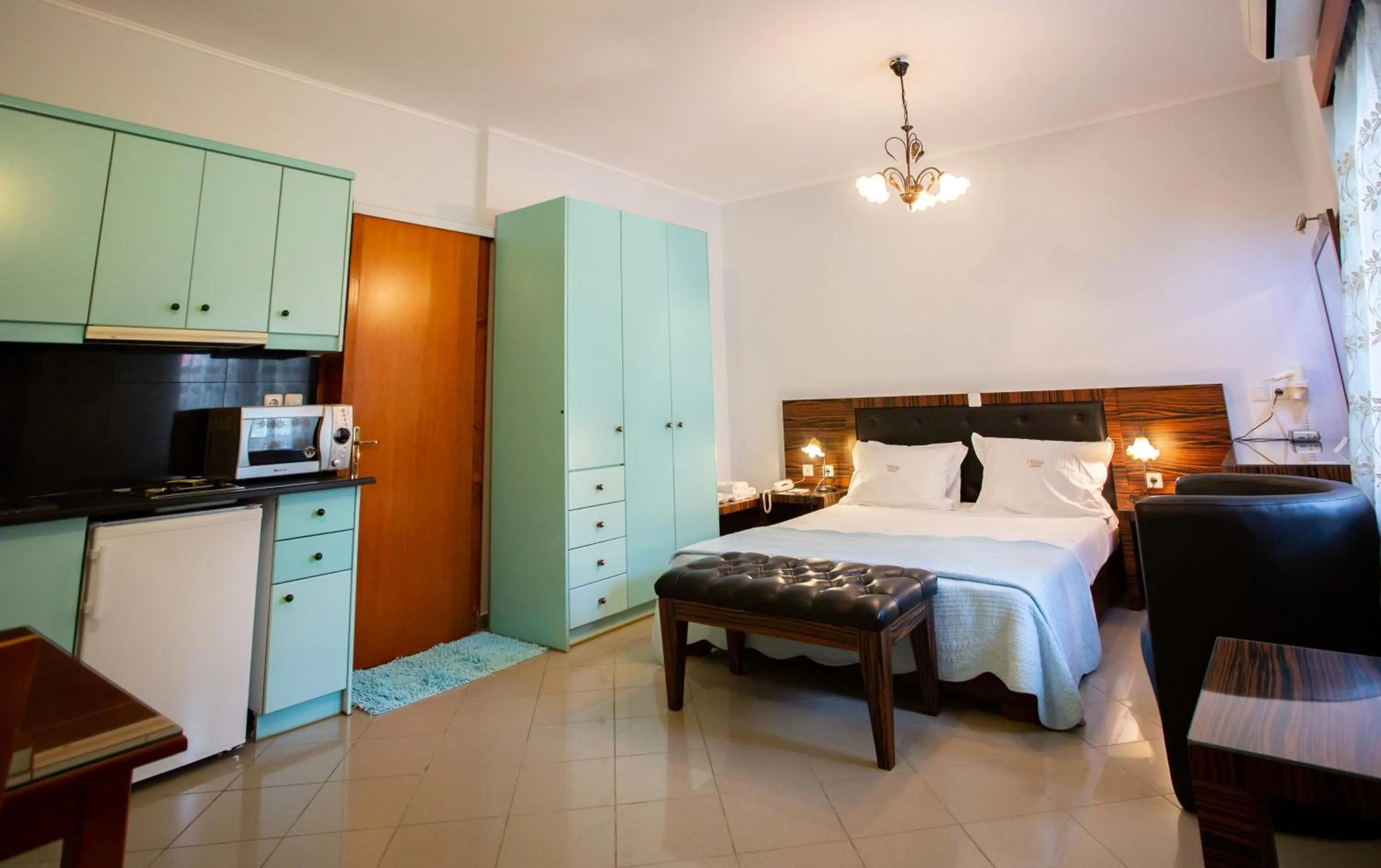 Property building, Bed in Irida Beach Resort Suites