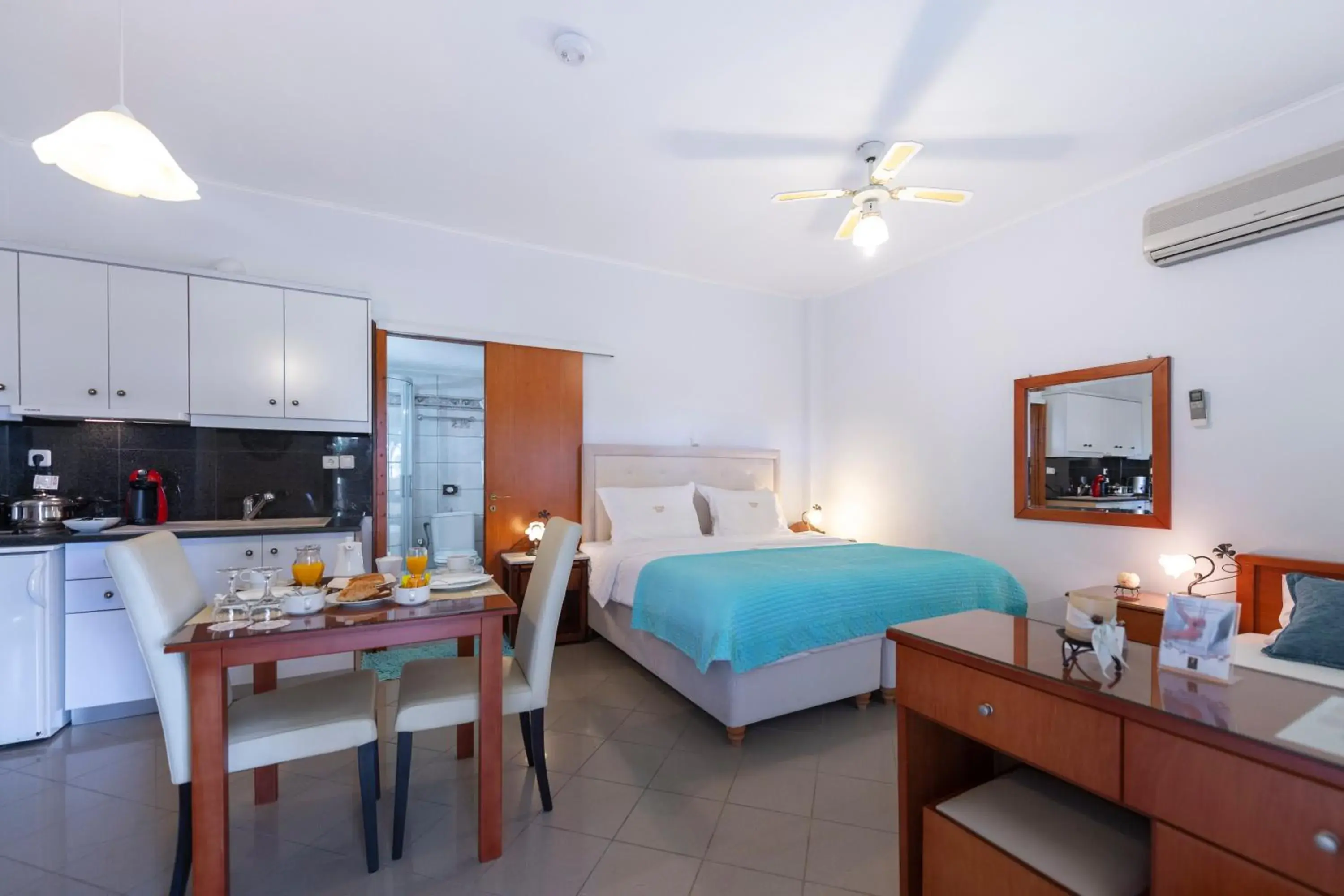 Property building, Bed in Irida Beach Resort Suites Property building, Bed in Irida Beach Resort Suites