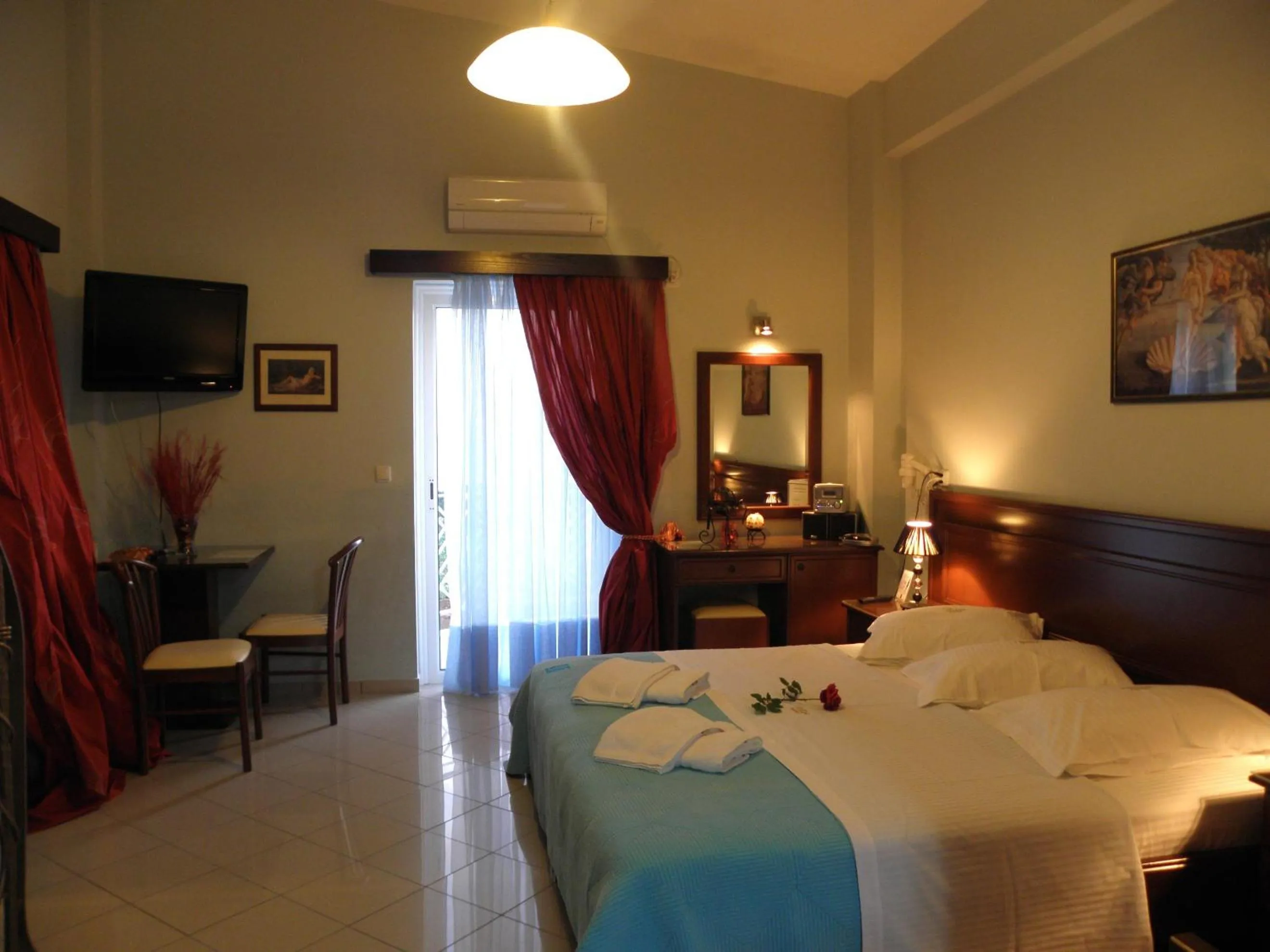 Photo of the whole room, Bed in Irida Beach Resort Suites