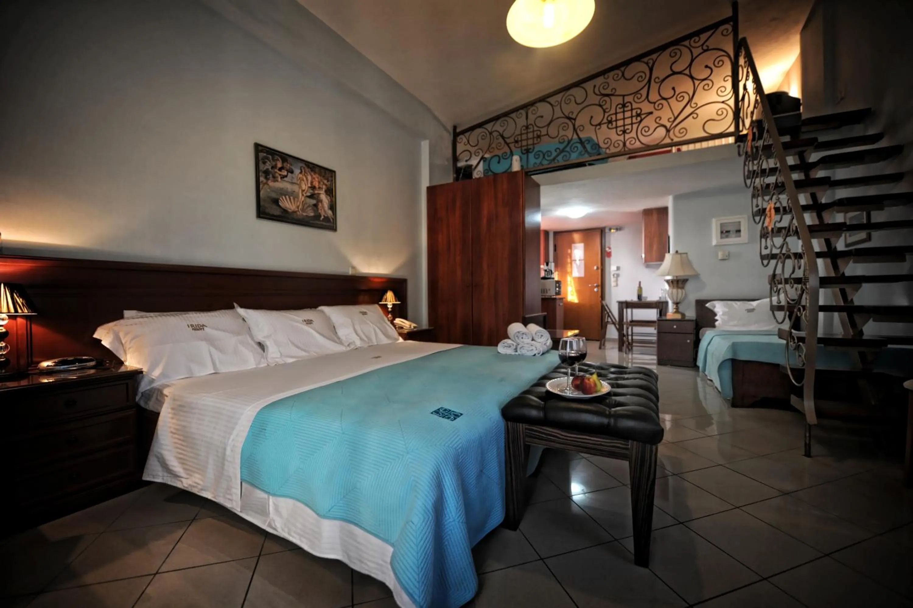 Bed in Irida Beach Resort Suites