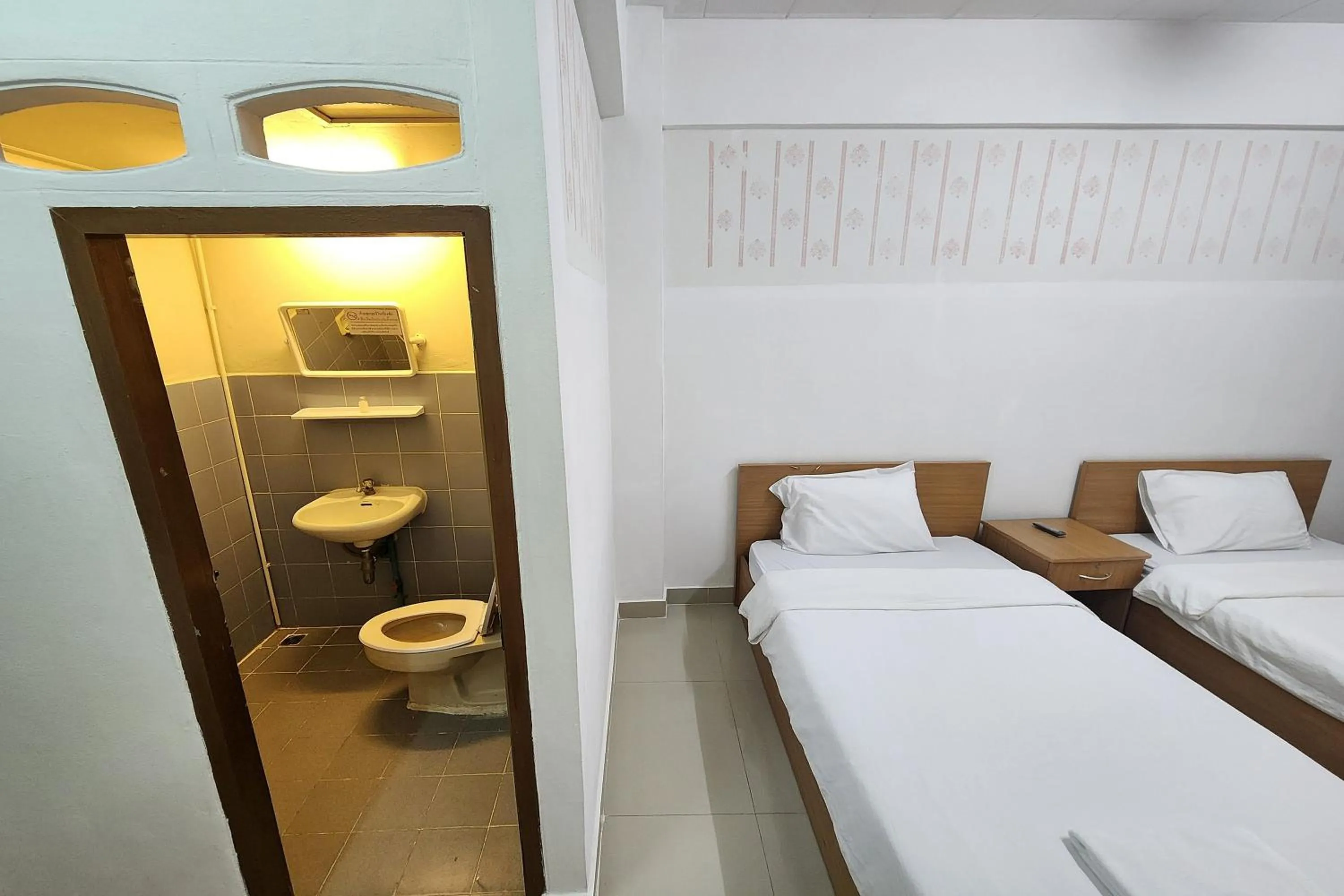 Toilet, Bed in Green Apartment Kaset