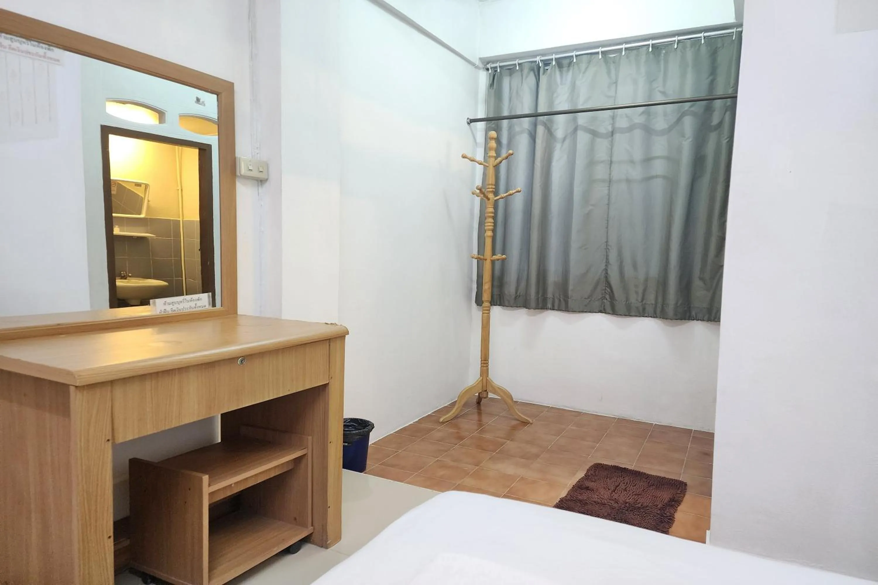 wardrobe, Bed in Green Apartment Kaset