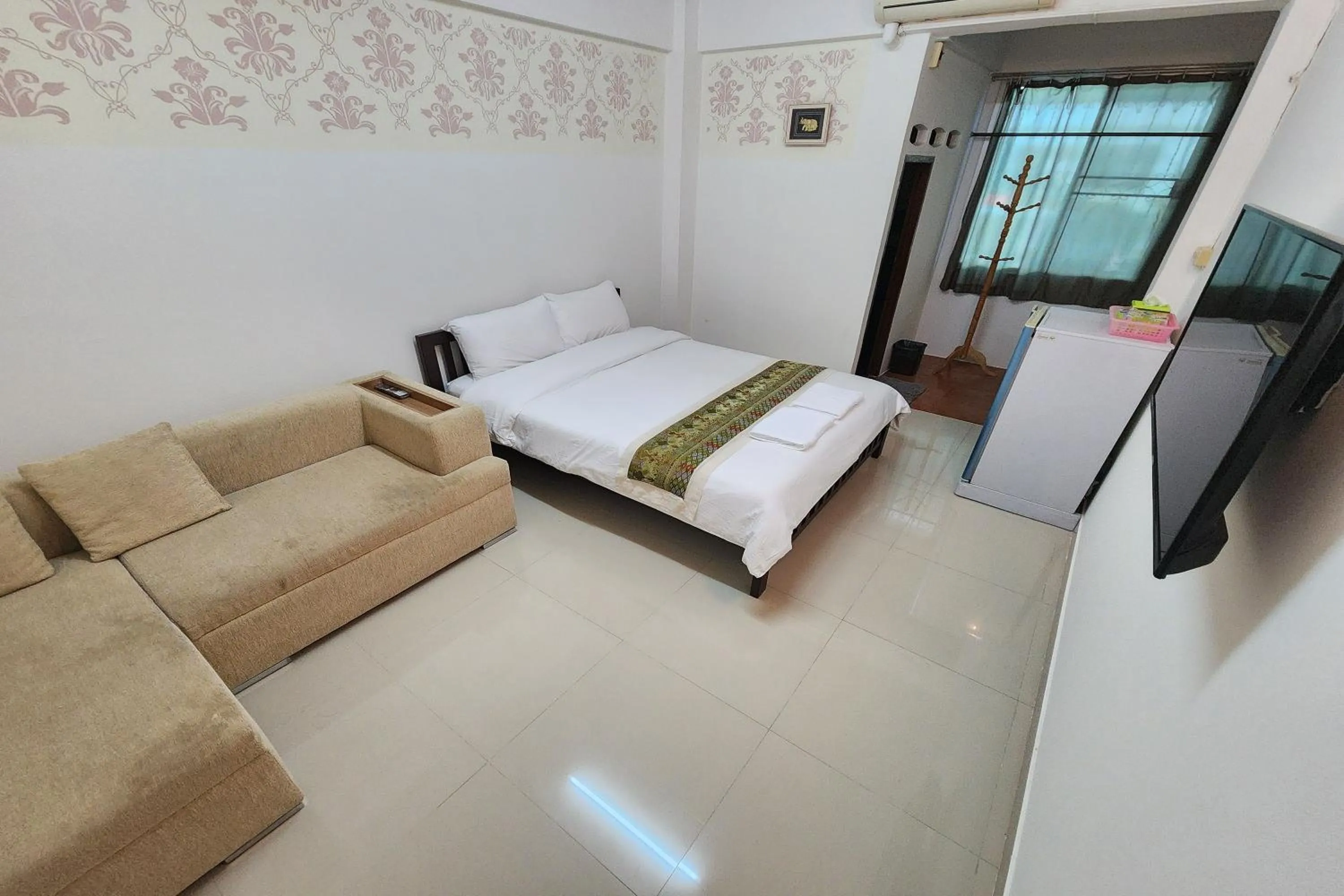 Bed in Green Apartment Kaset