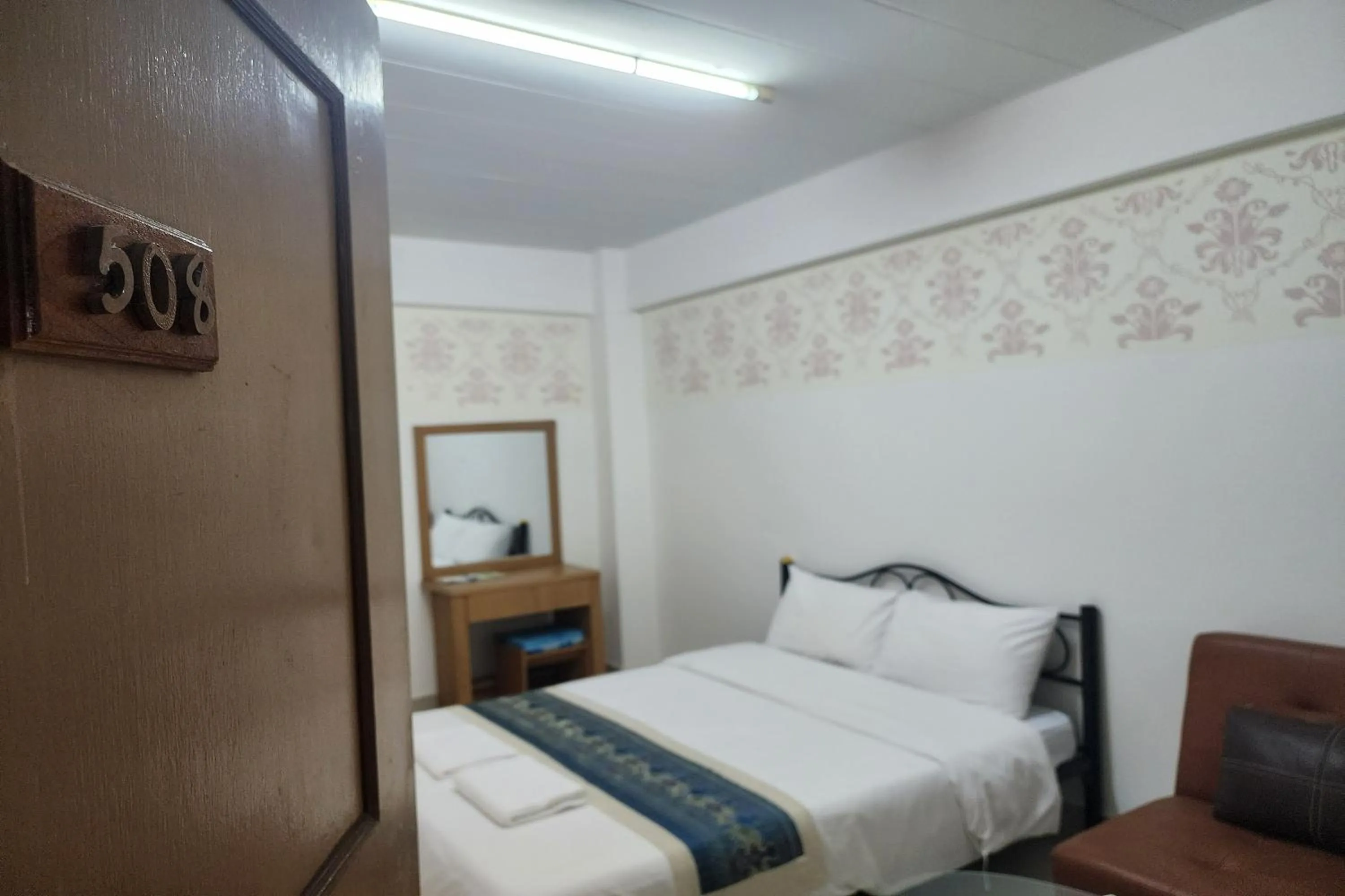 Bed in Green Apartment Kaset