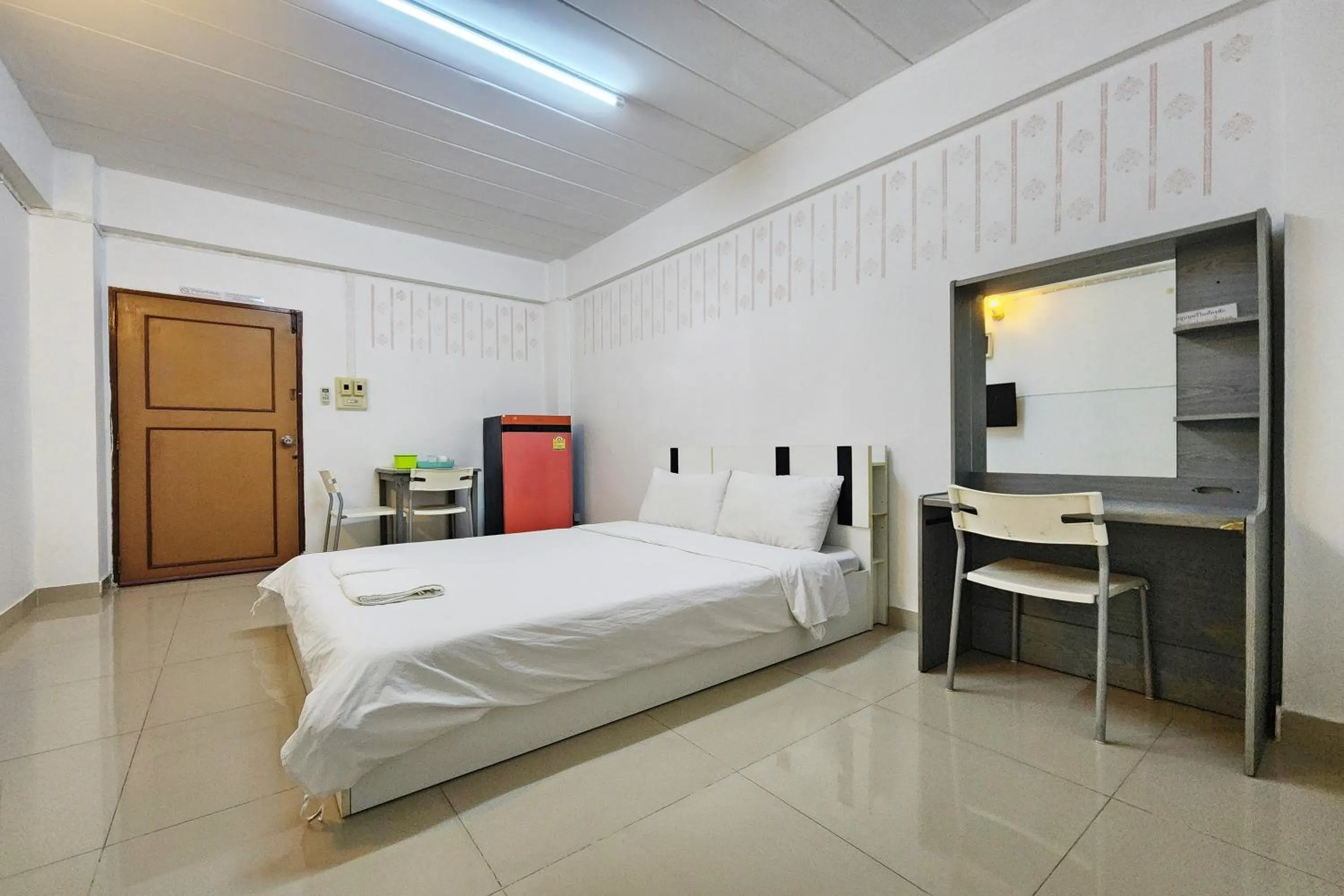 Bed in Green Apartment Kaset