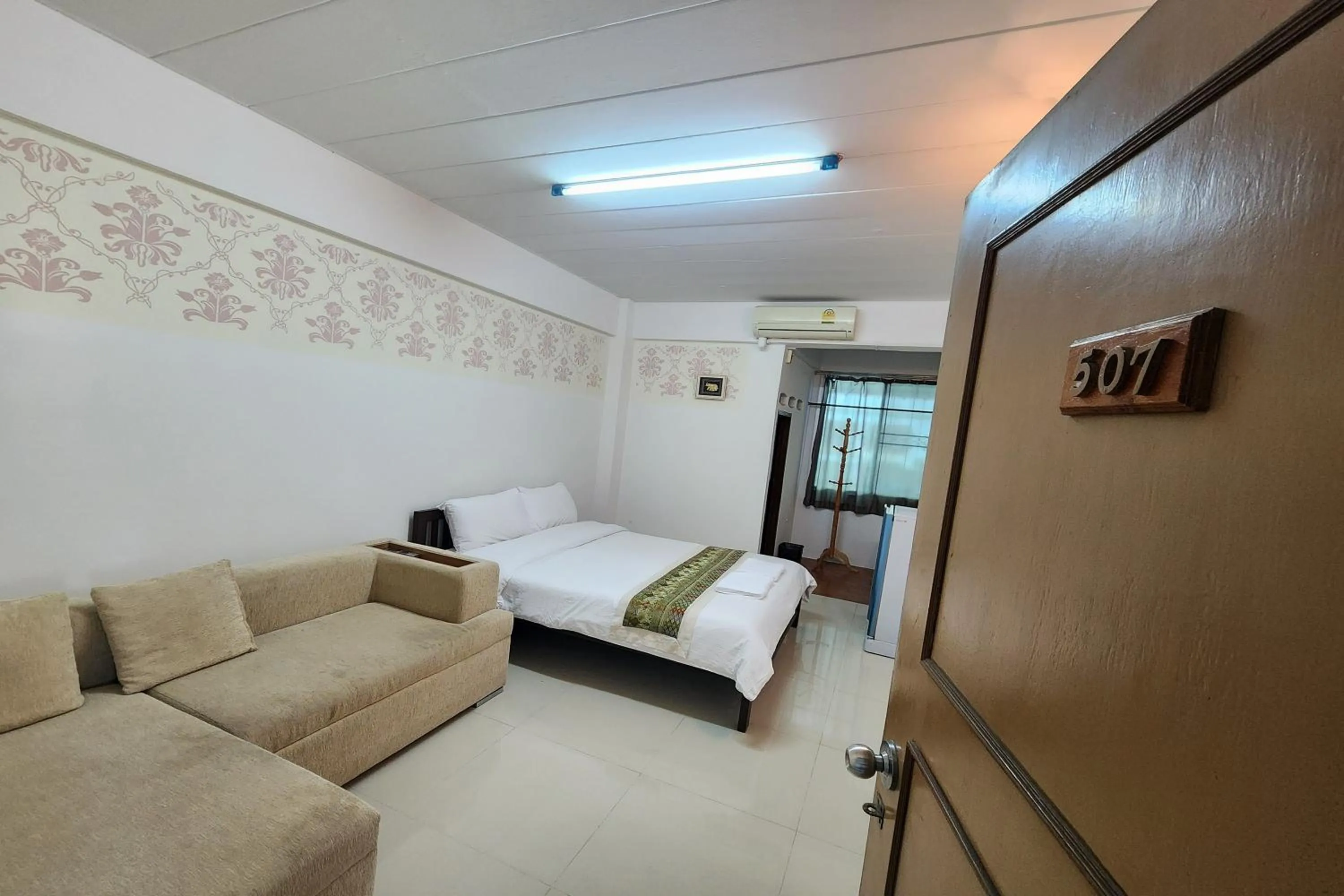 Bed in Green Apartment Kaset